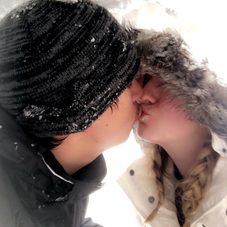 Our neighborhood kids built an igloo and we snuck in for a private kiss.
