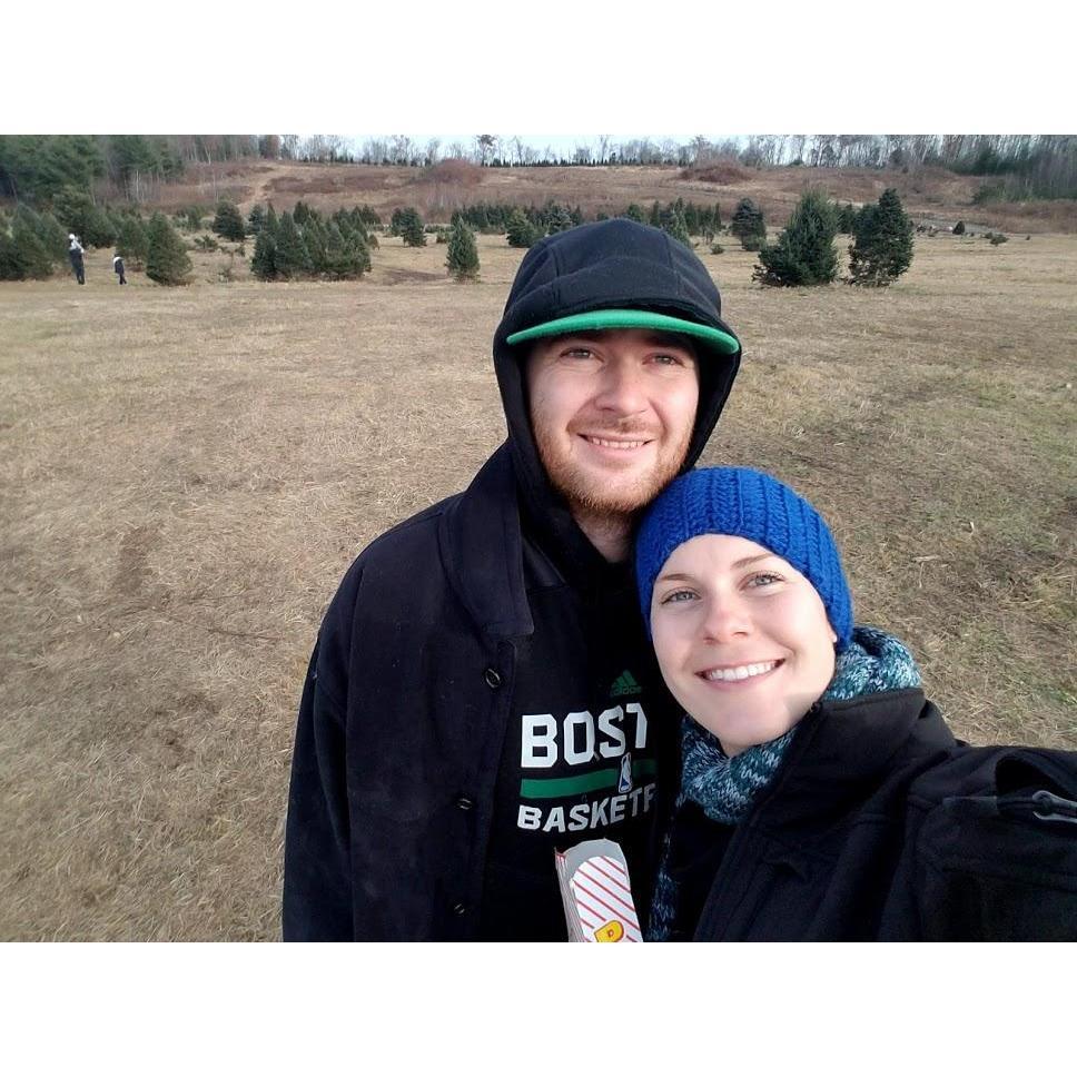 Cutting our first Christmas tree...way harder than we expected haha