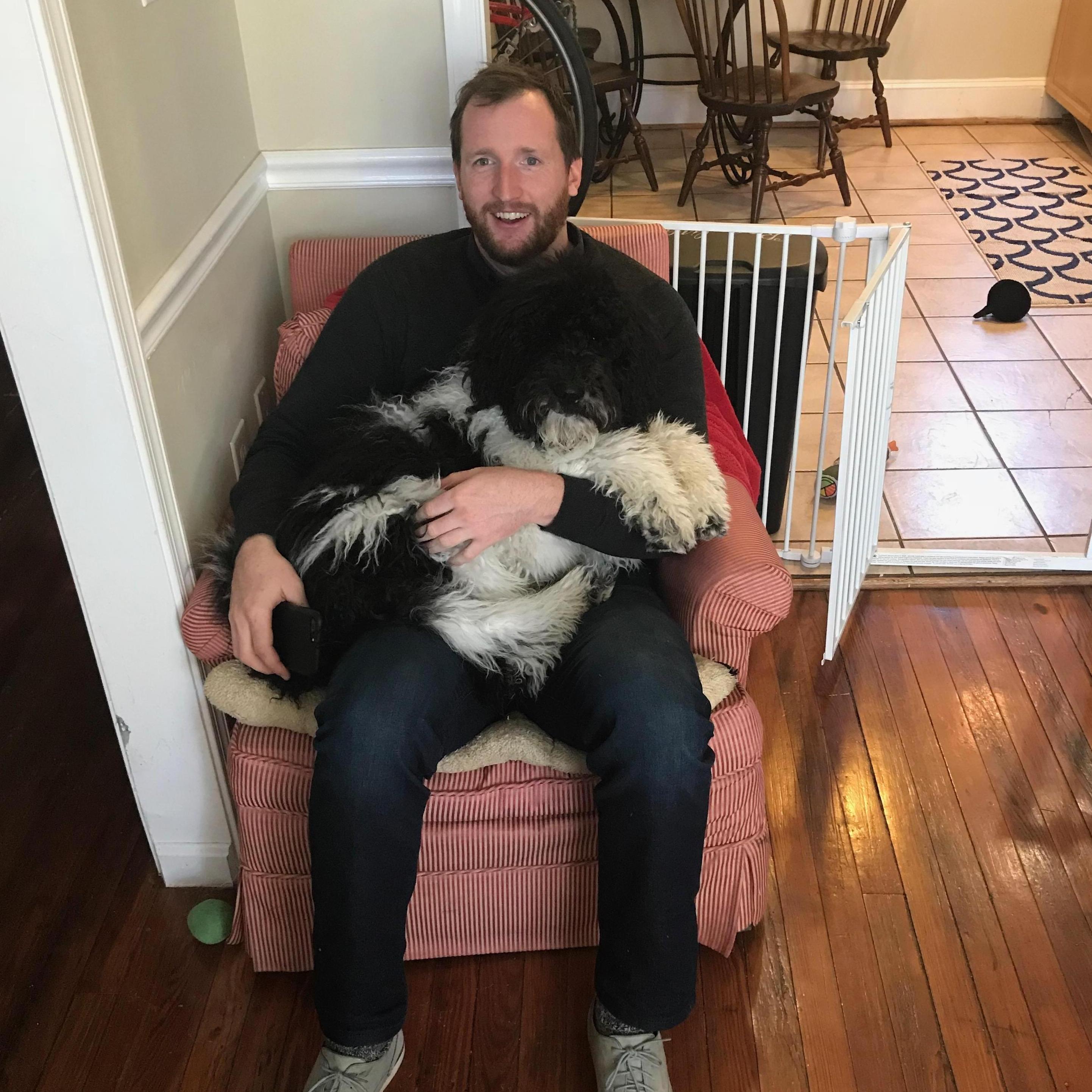 A young Alfie, in the lap of his best bud.