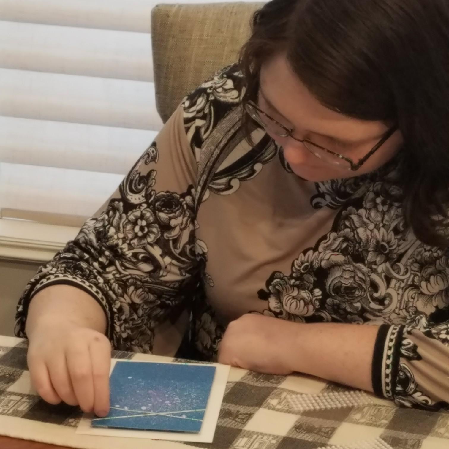 Elise is hard at work on our save the dates!