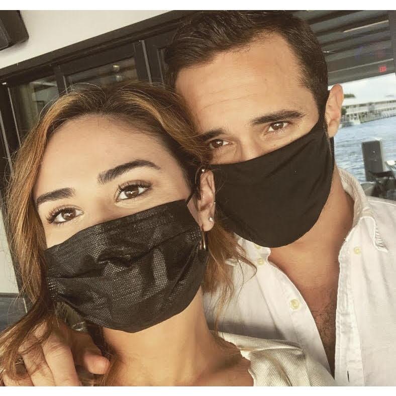 One of our very first dates: masked up, socially distanced, and somehow already inseparable.