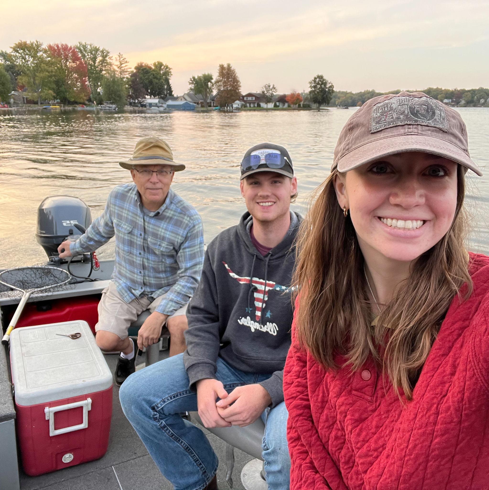 This picture was taken moments before Emma accidentally got a fish hook stuck in Caleb's neck while fishing with Papa!