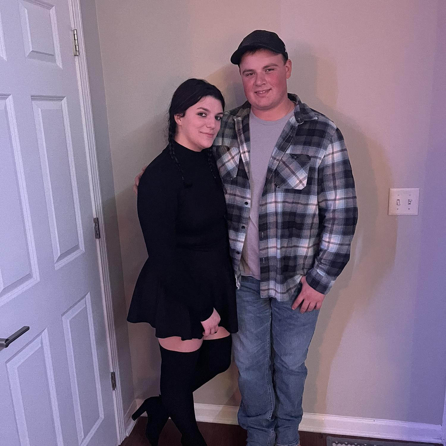 Erik refused to dress up for Halloween, but Sam went as Wednesday Adam's who her parents regularly described her as