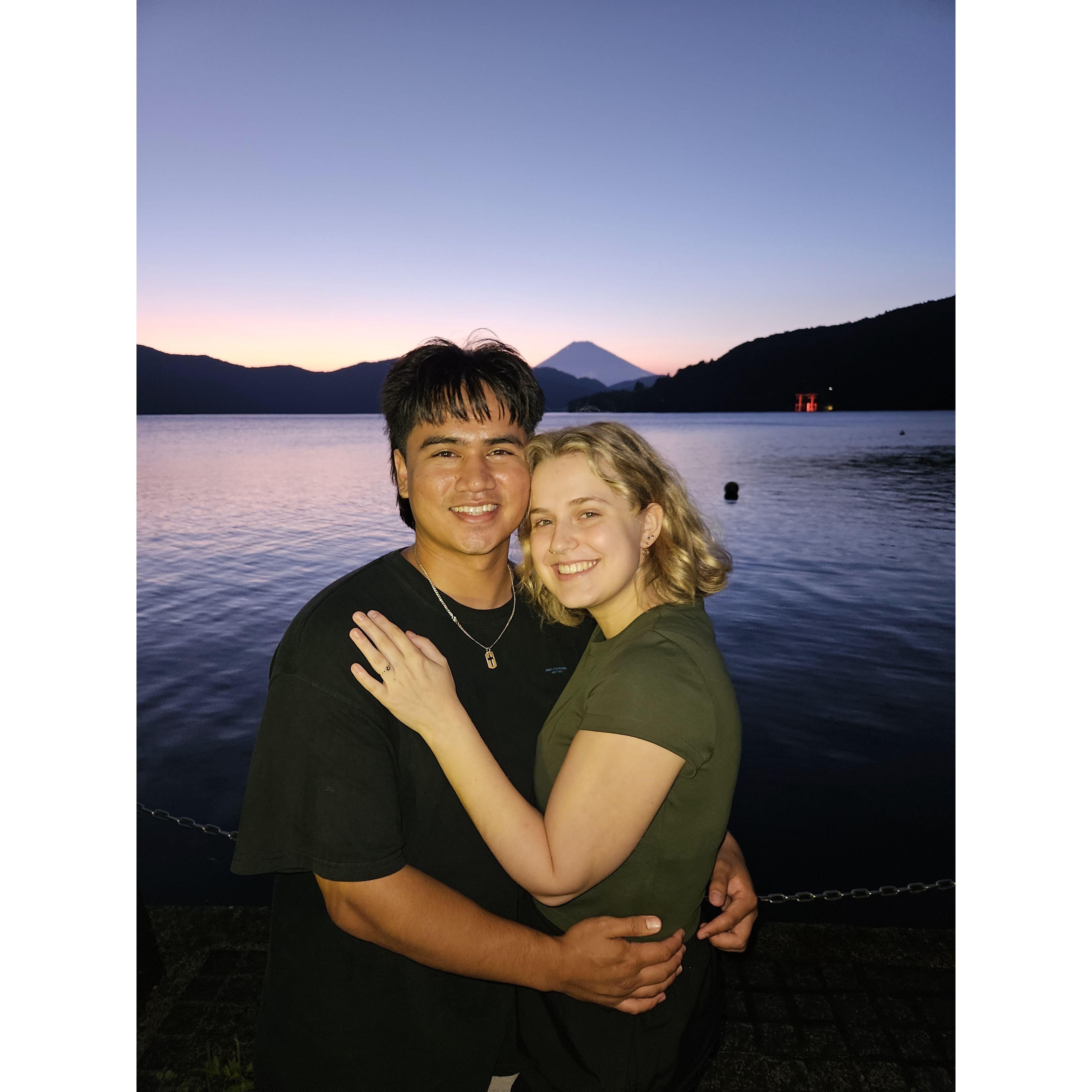 In front of Lake Ashi in Hakone, Japan. Right after Grant proposed.