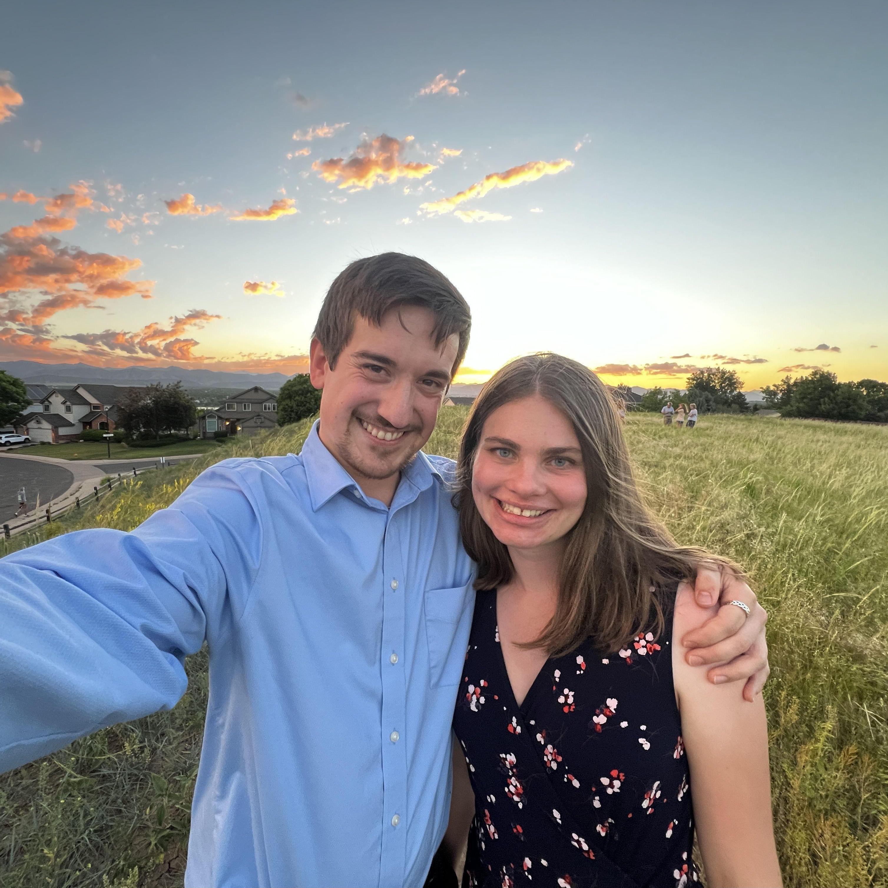 A sunset picture of Alyssa and Donovan nearby Saint Mary's of Littleton!