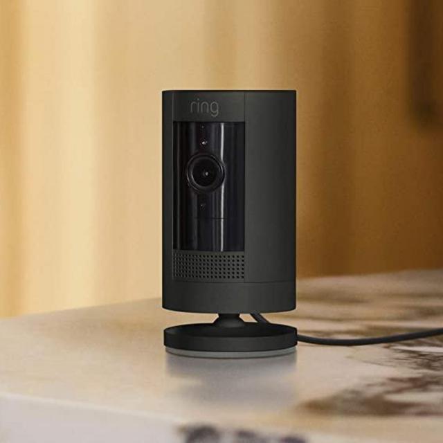 Ring Stick Up Cam Plug-In HD security camera with two-way talk, Works with Alexa - Black