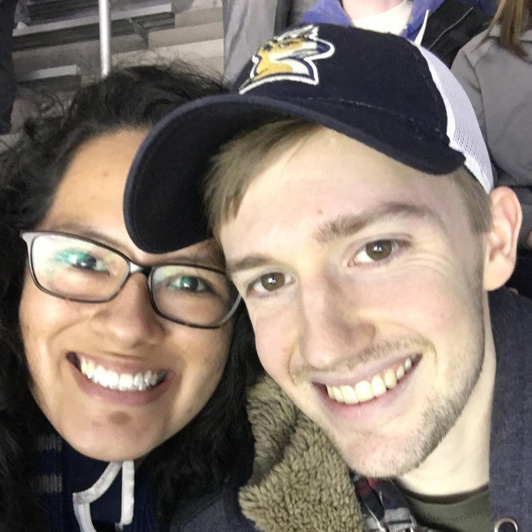 Nate took Lourdes to her first hockey game to cheer on the Nittany Lions