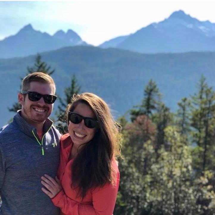 During our first vacation! Our smiles are almost as big as the mountains!
