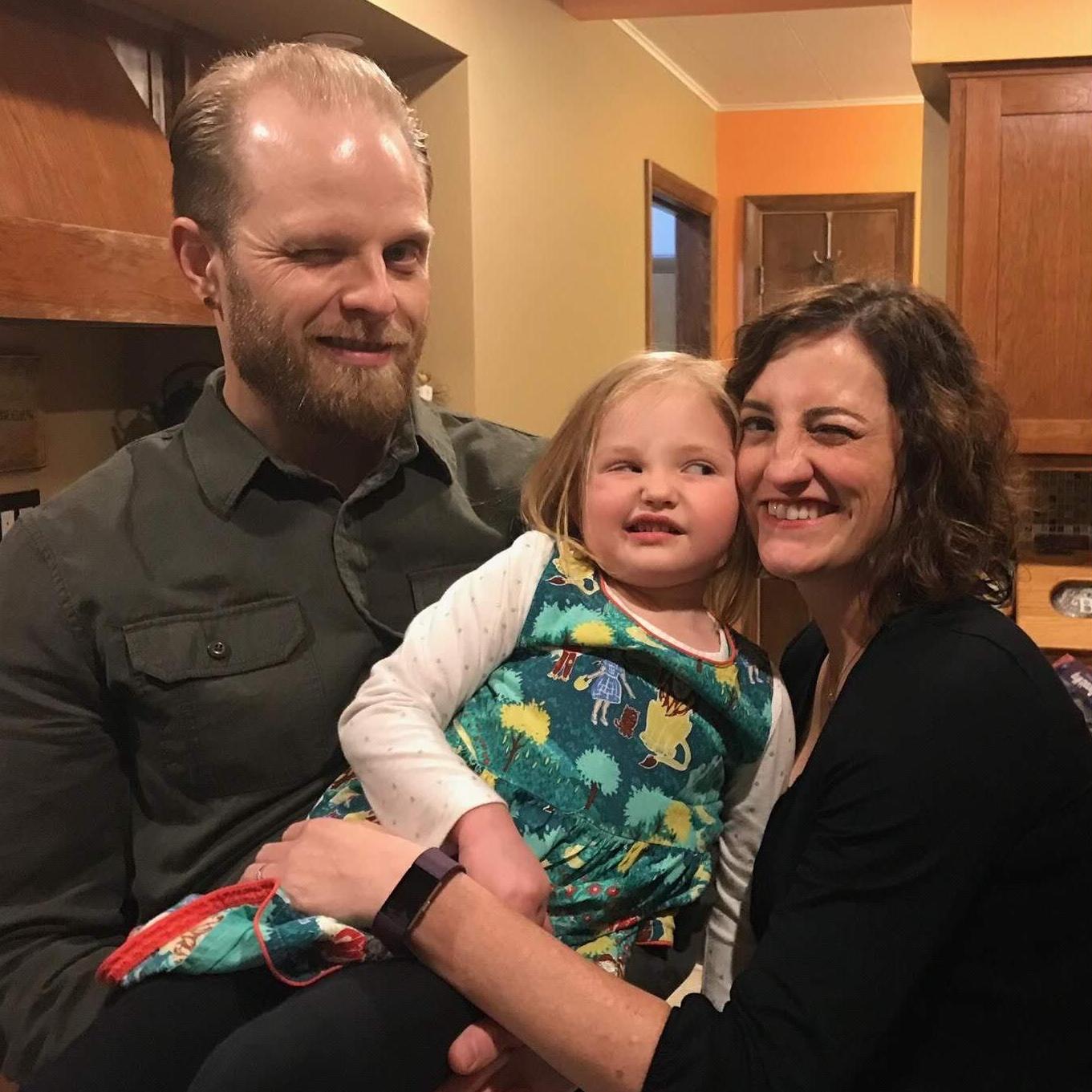 Here's a cute one with Donovan's niece and flower girl, Emma, winking.