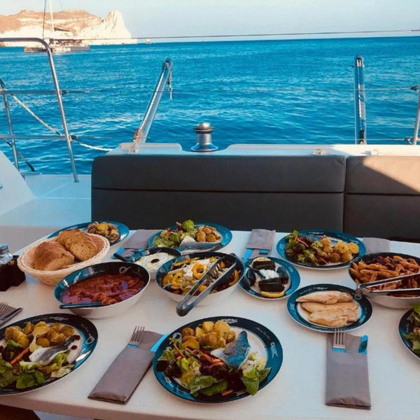 Santorini catamaran and Greek meal for 2
