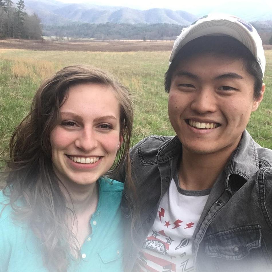 Yong and Elizabeth at Cades Cove, TN, Smokey Mountains in the background. (03/2018, Knoxville, TN)