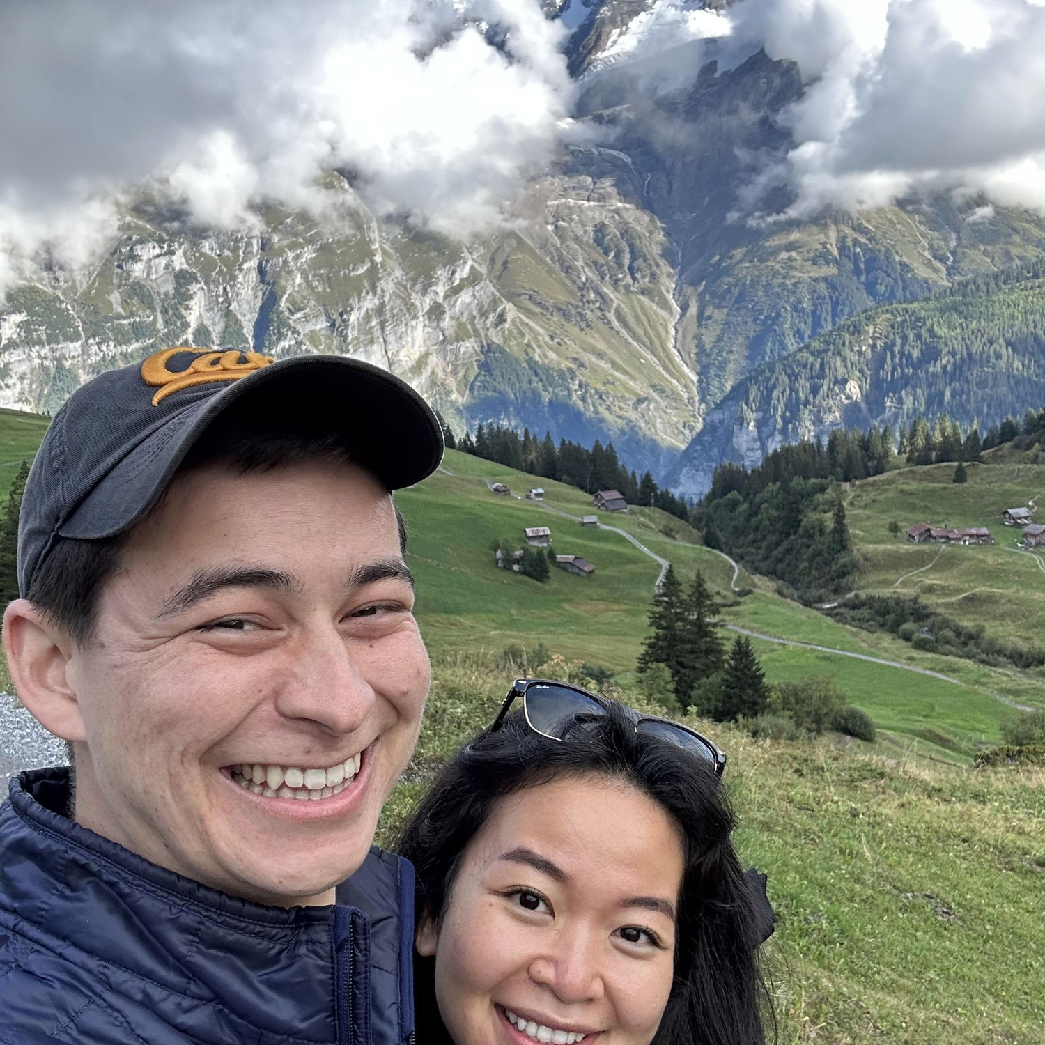The mountains in Switzerland were so high up that Vy's face got cut-off in the photo