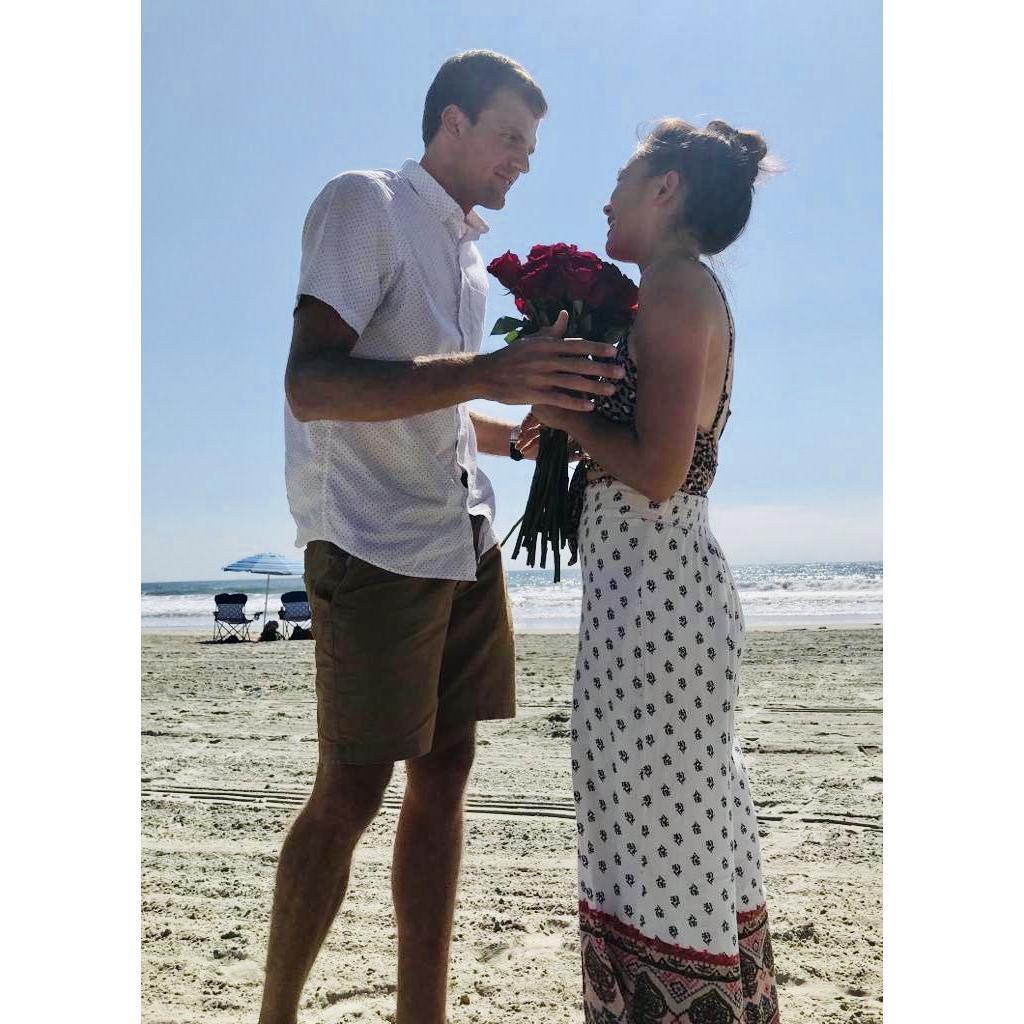 This picture was taken shortly after Christian came out of nowhere and surprised Erin for her 30th birthday on the beach. She was very shocked and impressed.