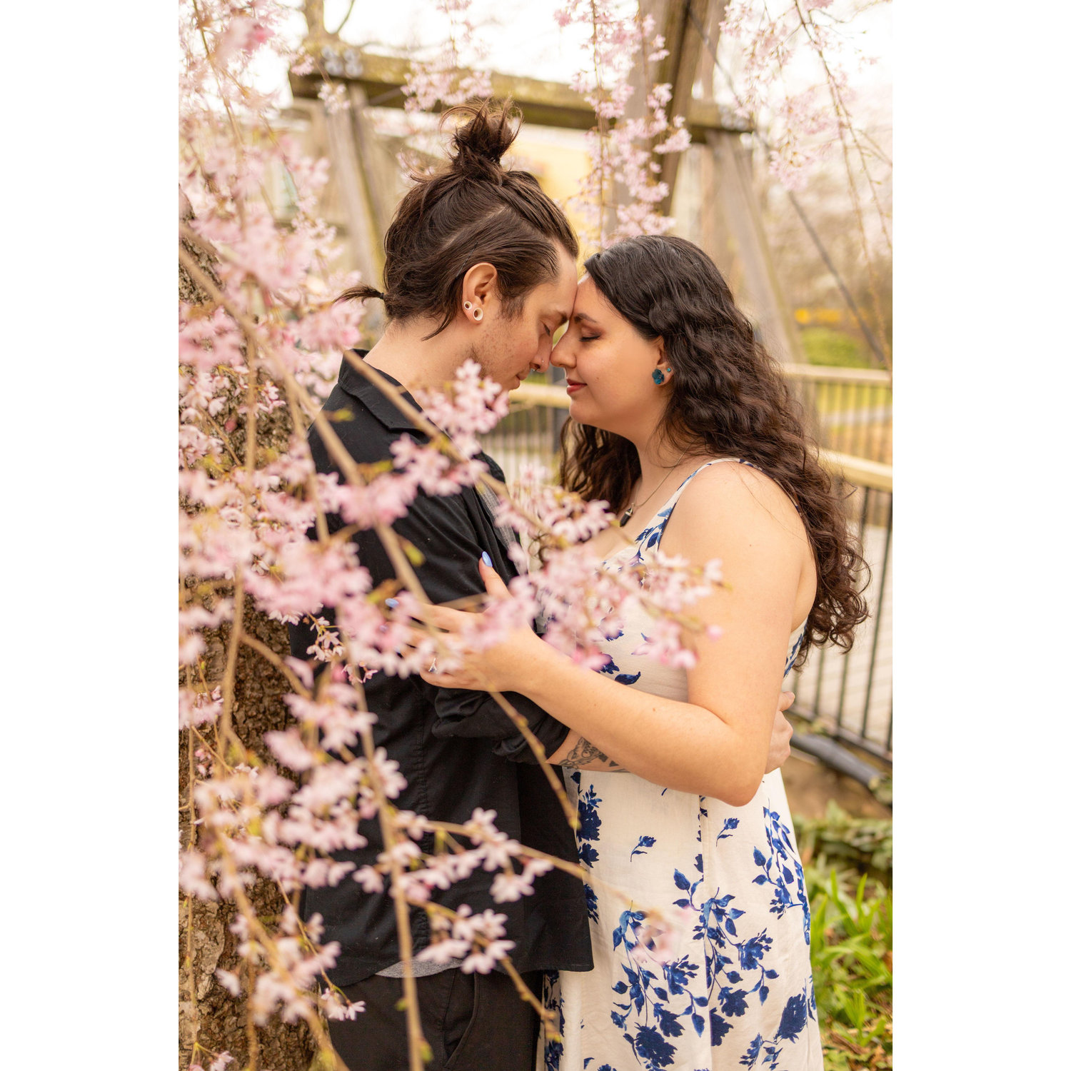 One of our frist dates was to go see the cherry blossoms in DC, so we saw it fitting to do our engagement shoot under the cherry blossoms too.