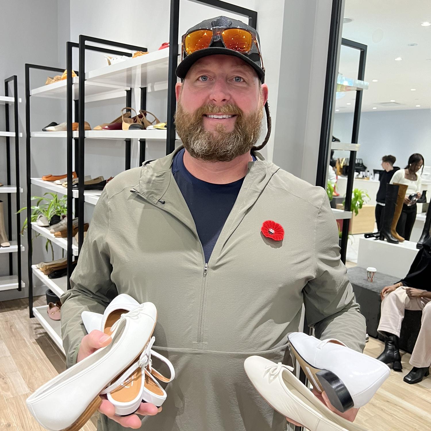 Matt helping find wedding shoes for Kyla. 💕