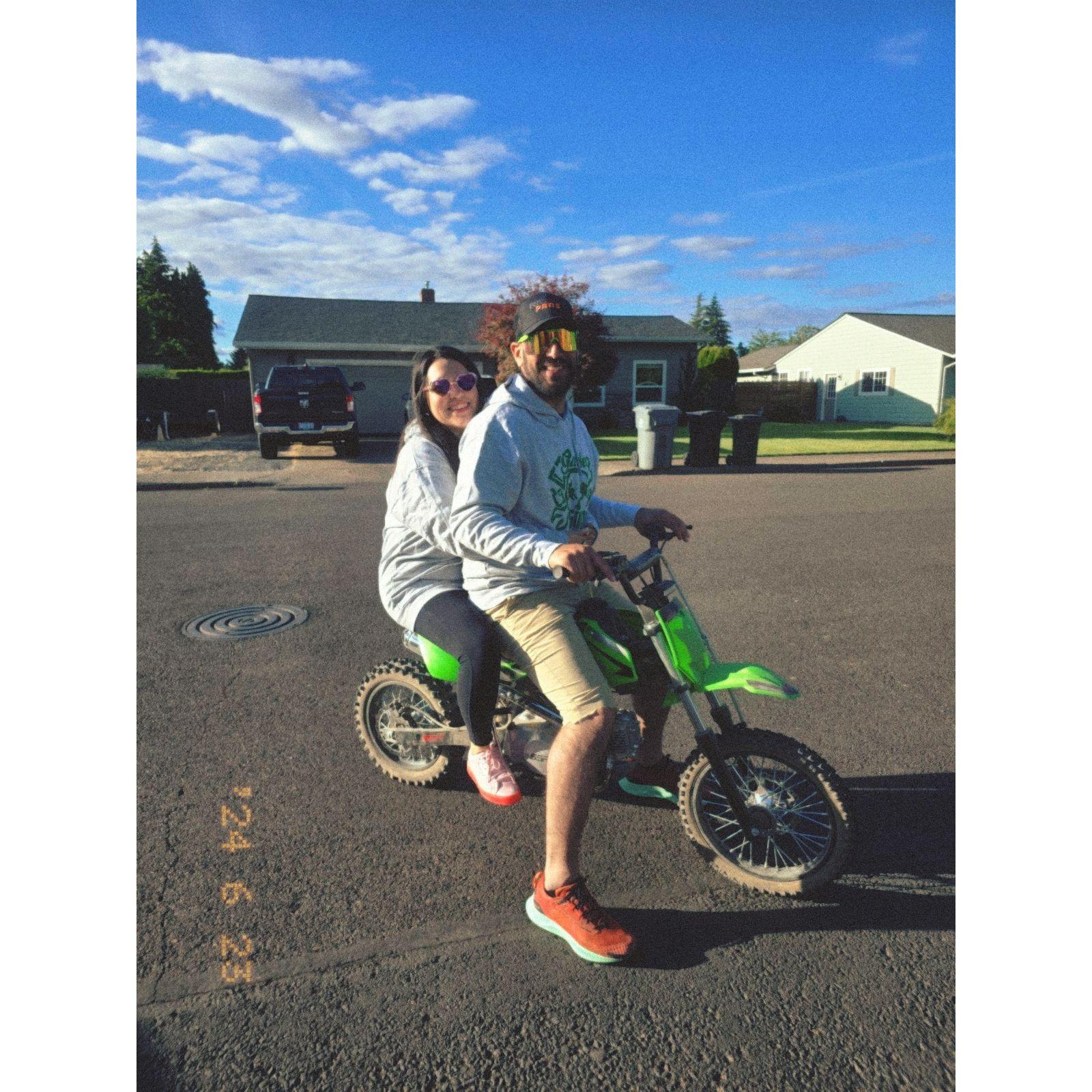 Riding a pit bike together.