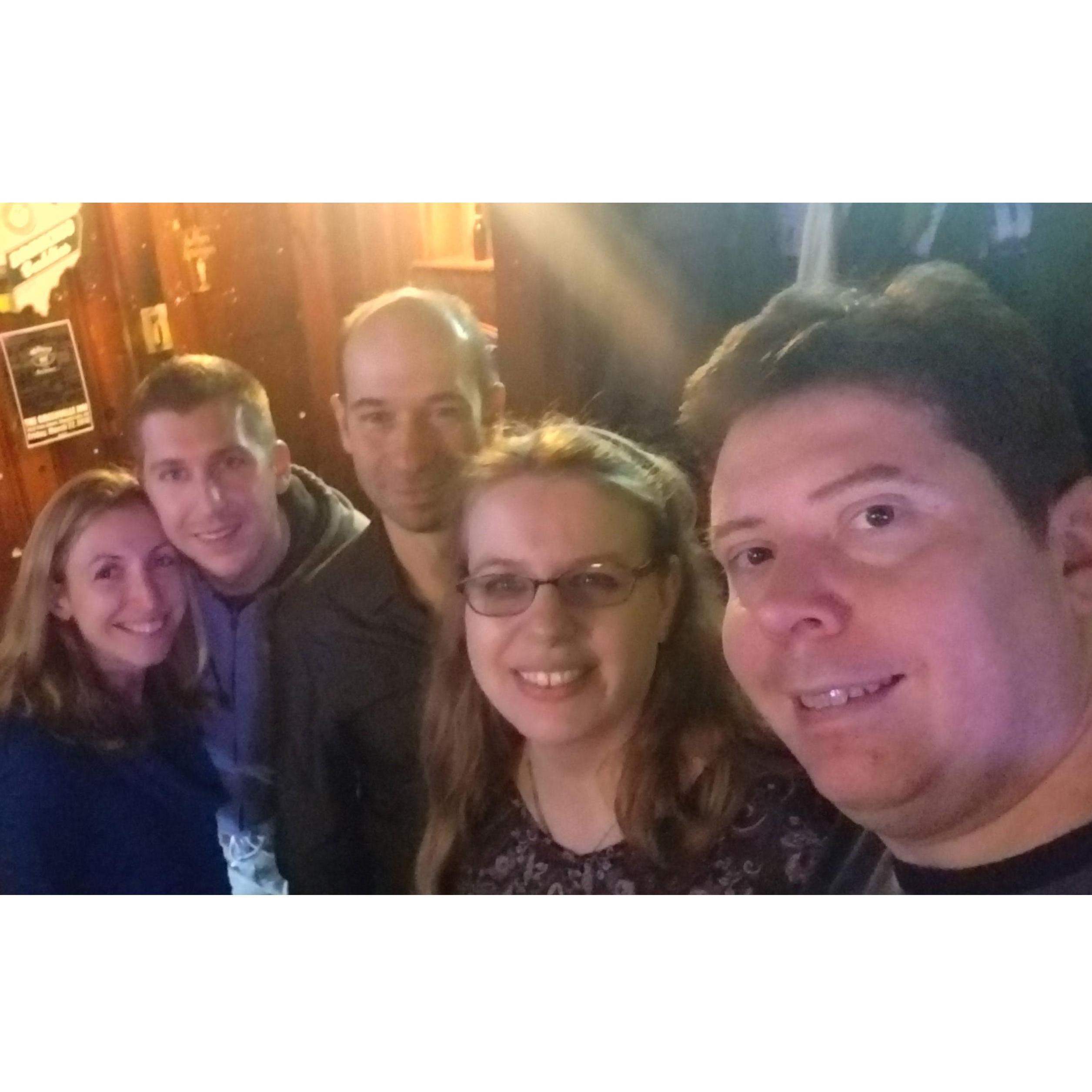 My friends, Amber, Eric and Greg living it up at a bar.