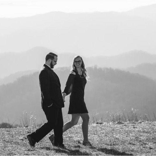 Hand in hand, we stride together.