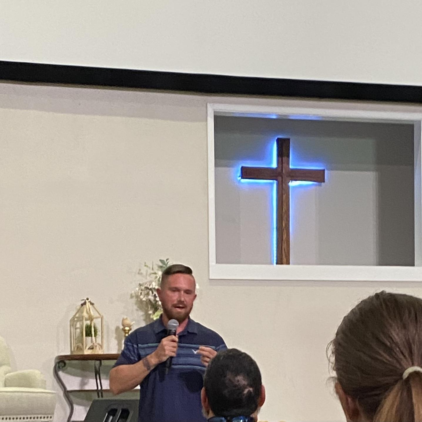 Blake sharing his story at another church.