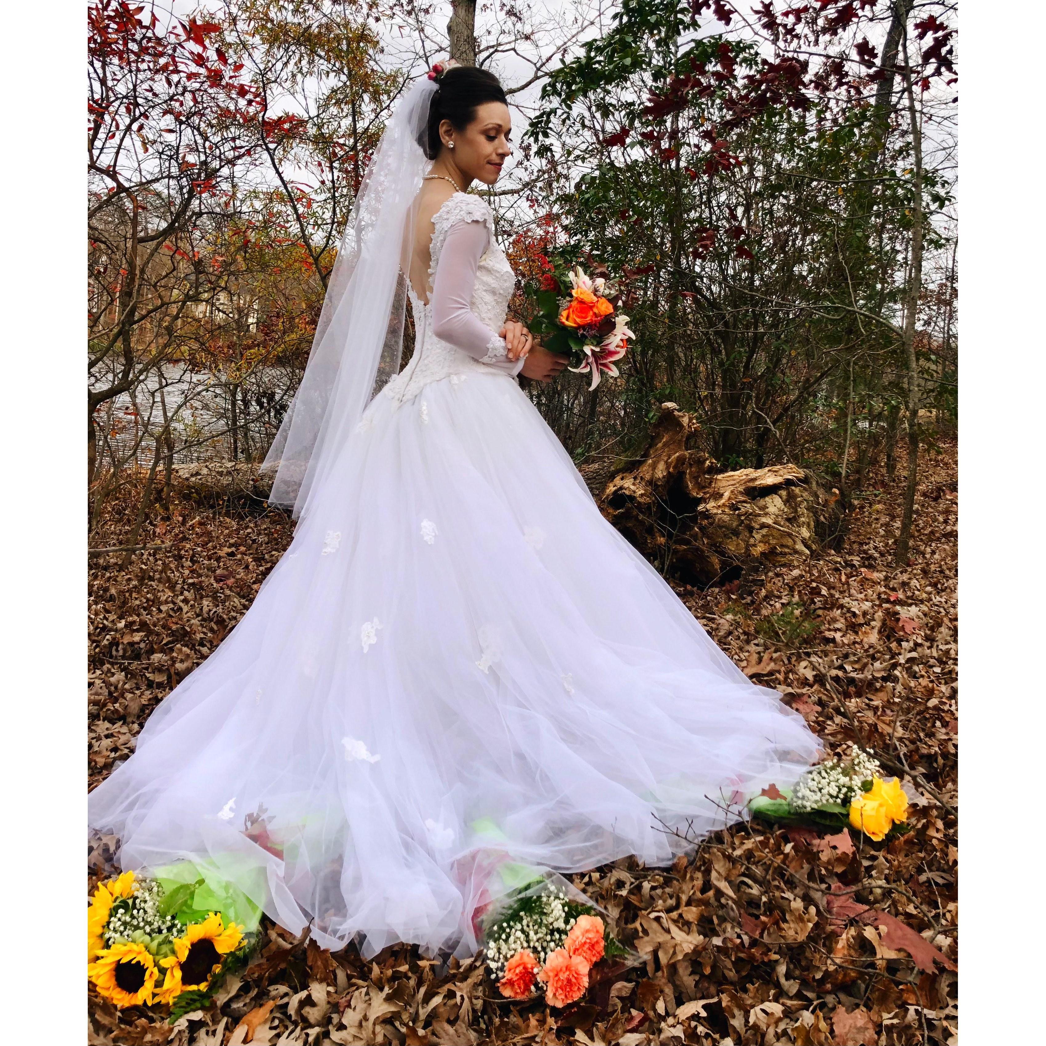 Amberly's mom has a photo taken at her wedding with her bridesmaid flowers around her dress. We used the gratitude flowers we gave our parents to recreate the next generation moment.