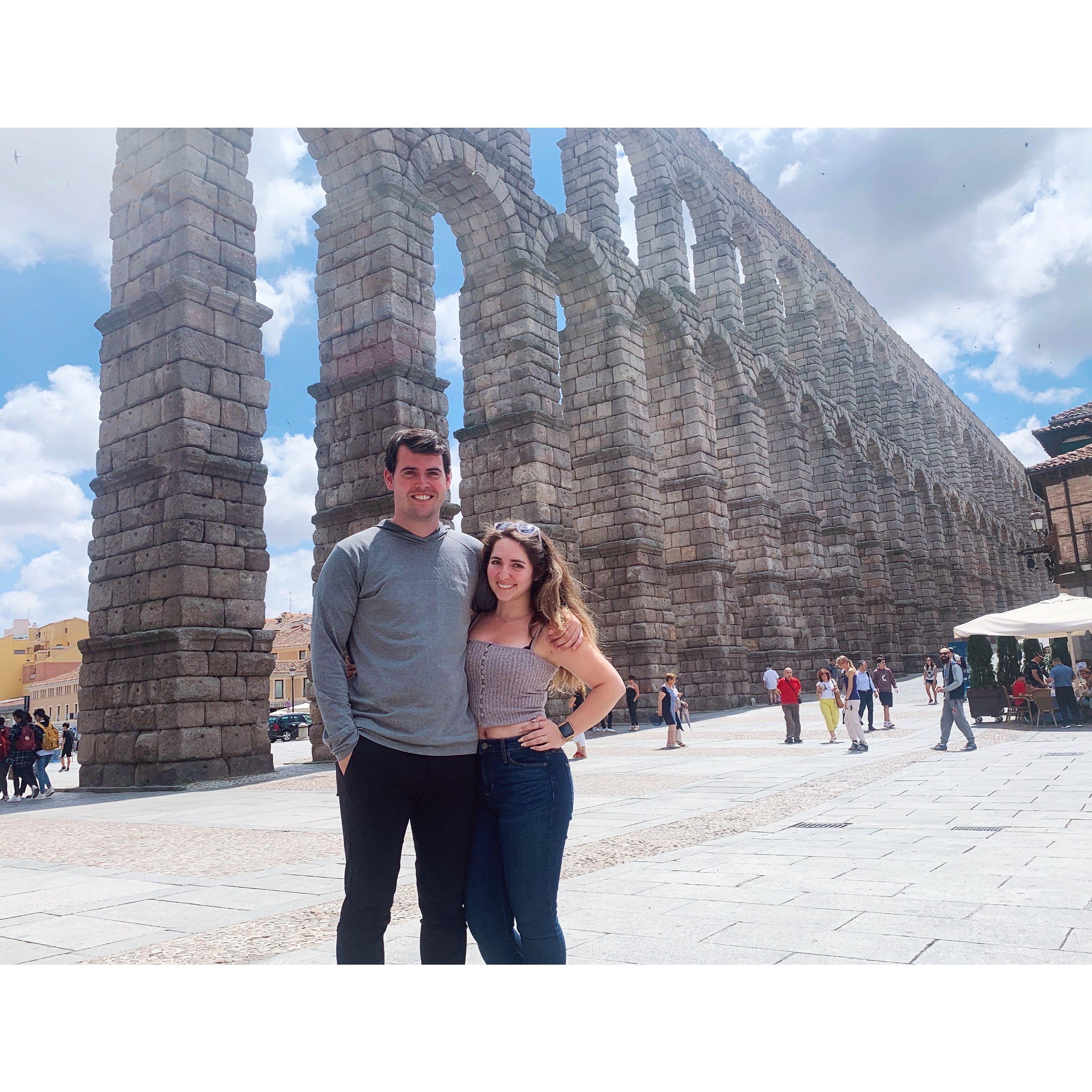 July 9, 2019 - We go to Spain together for the first time! Our first international trip together as well. This picture is taken under the Roman aqueduct in Segovia