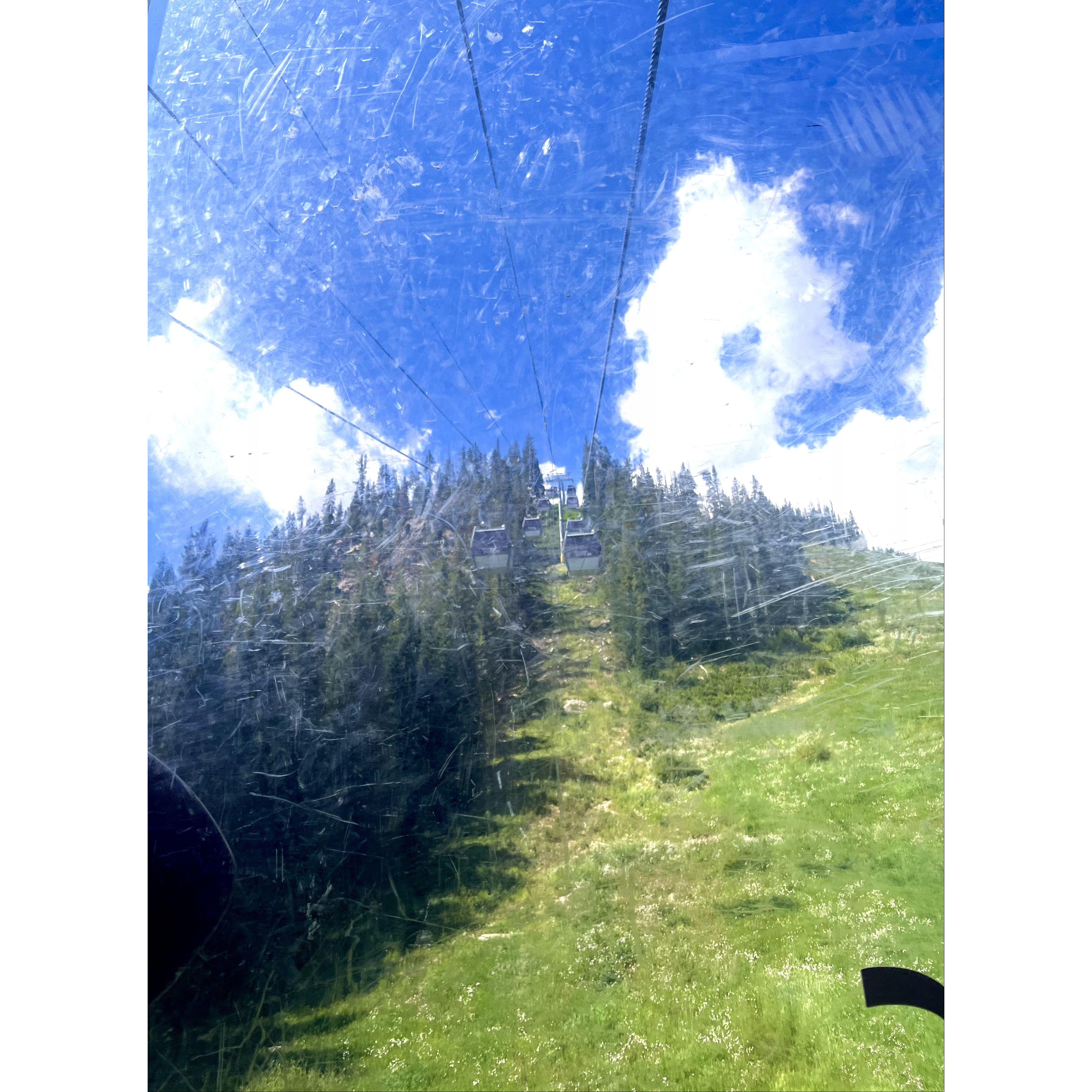 Going up the mountain in the gondola. We played our song and slow danced the whole ride.