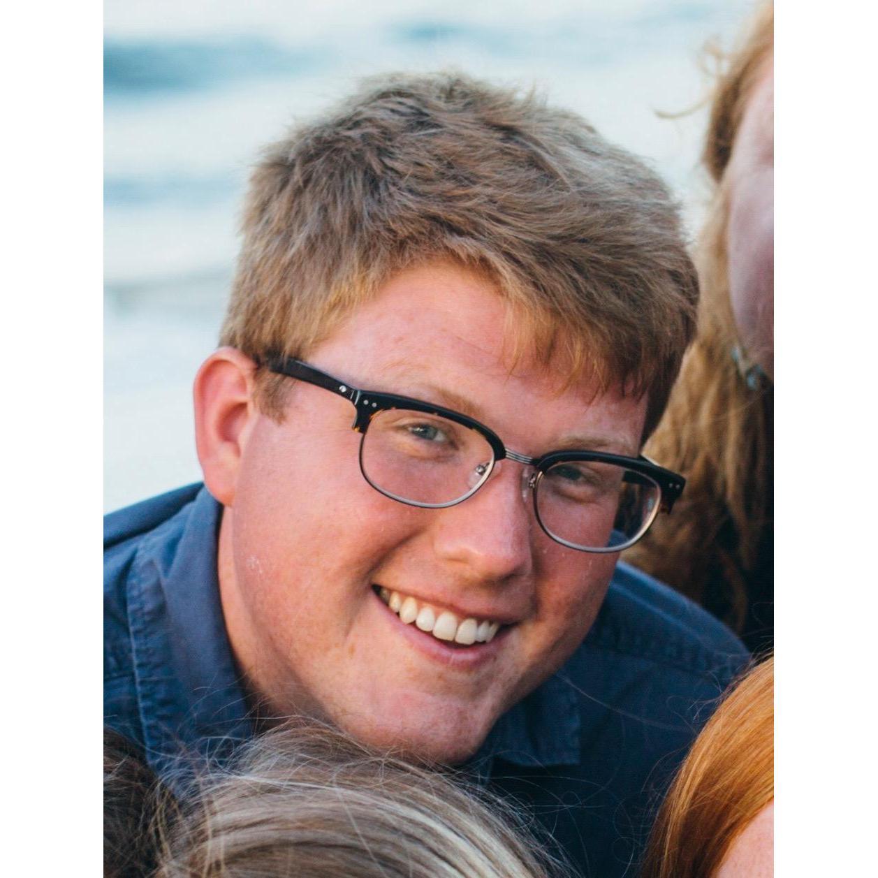 This is Mark's Eharmony profile picture (totally cropped his family out).