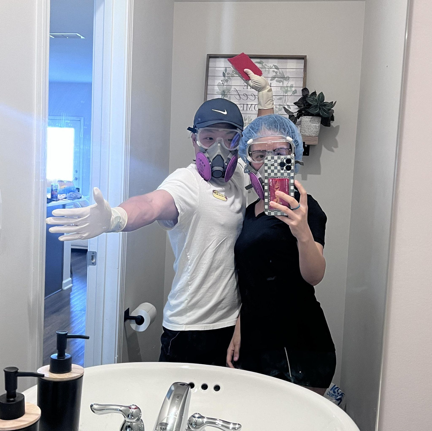 Us working on one of the many home projects. Jason is very handy!!