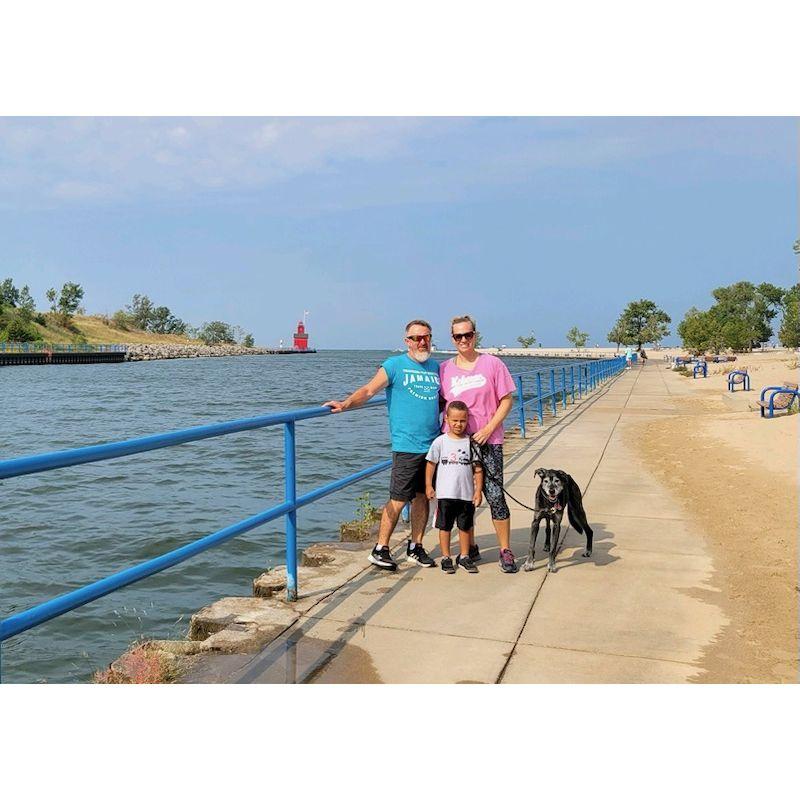 Kelli grew up visiting here annually but this was our first time together. Holland, Michigan with Big Red in the background.