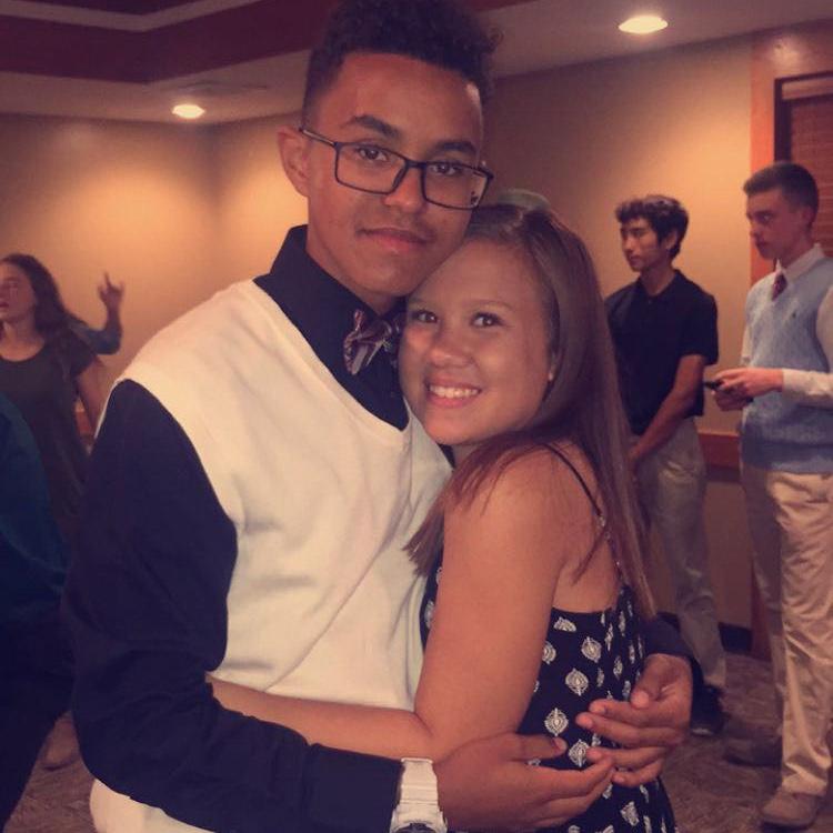 Our story began here—14 and 15 years old at the cross country banquet, our very first photo together. Javante asked Mya to be his girlfriend the next day!