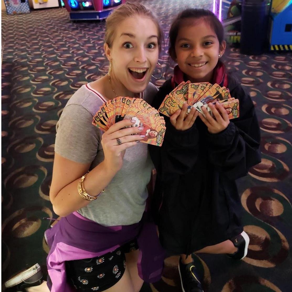 Ellie and Monica with all of our tickets from the Haunted Trails Arcade