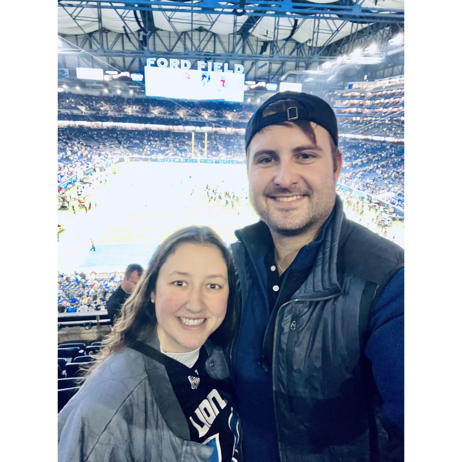 At our first Lion's game together (2024).
