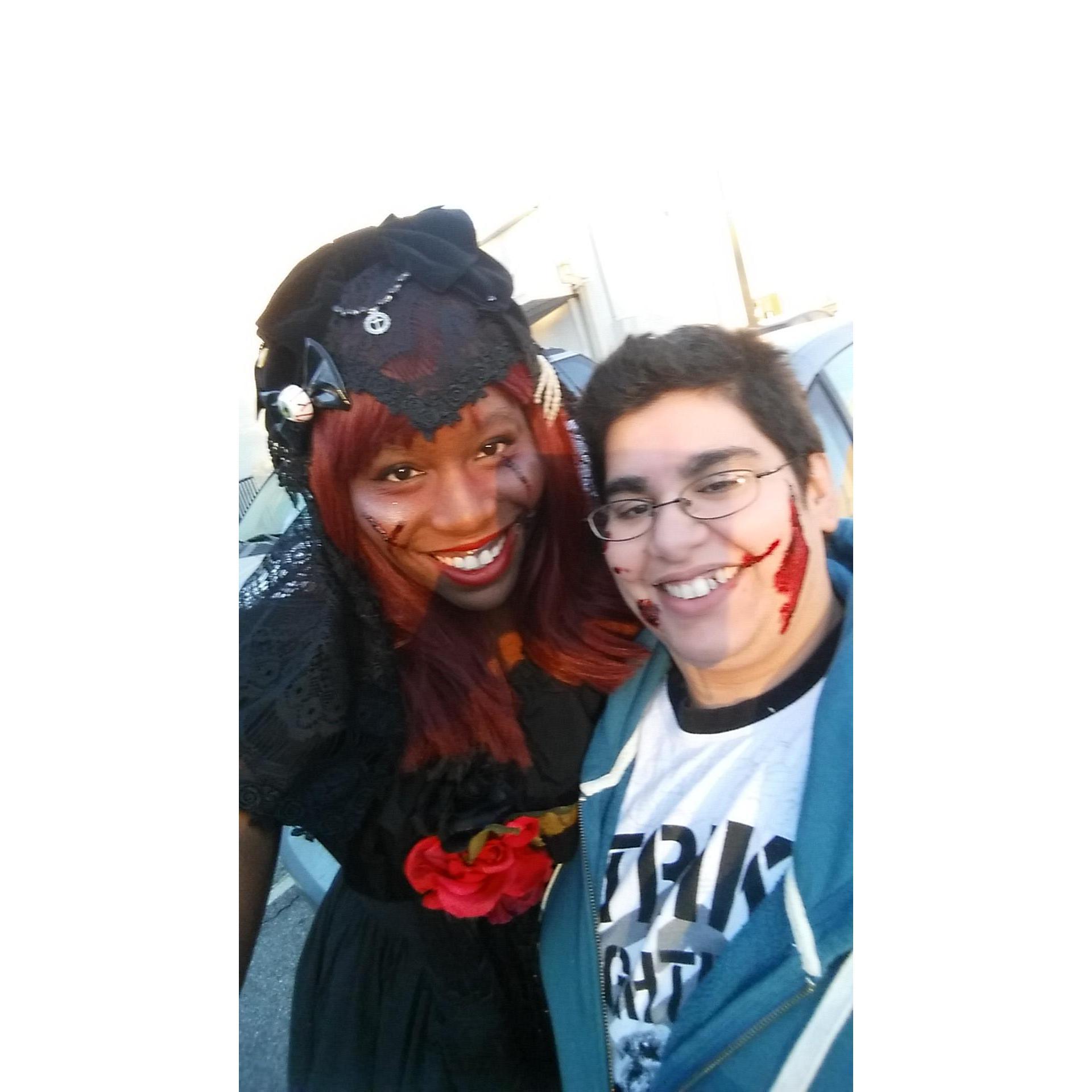 Costume Day at work (Donni, actually wearing an alternative street fashion from Japan, and Sheena being bit by a zombie while chilling at the beach... she just wanted an excuse to wear shorts at work)