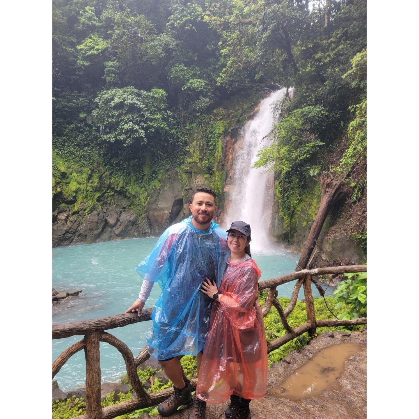 Getting showered by the waterfall in Costa Rica