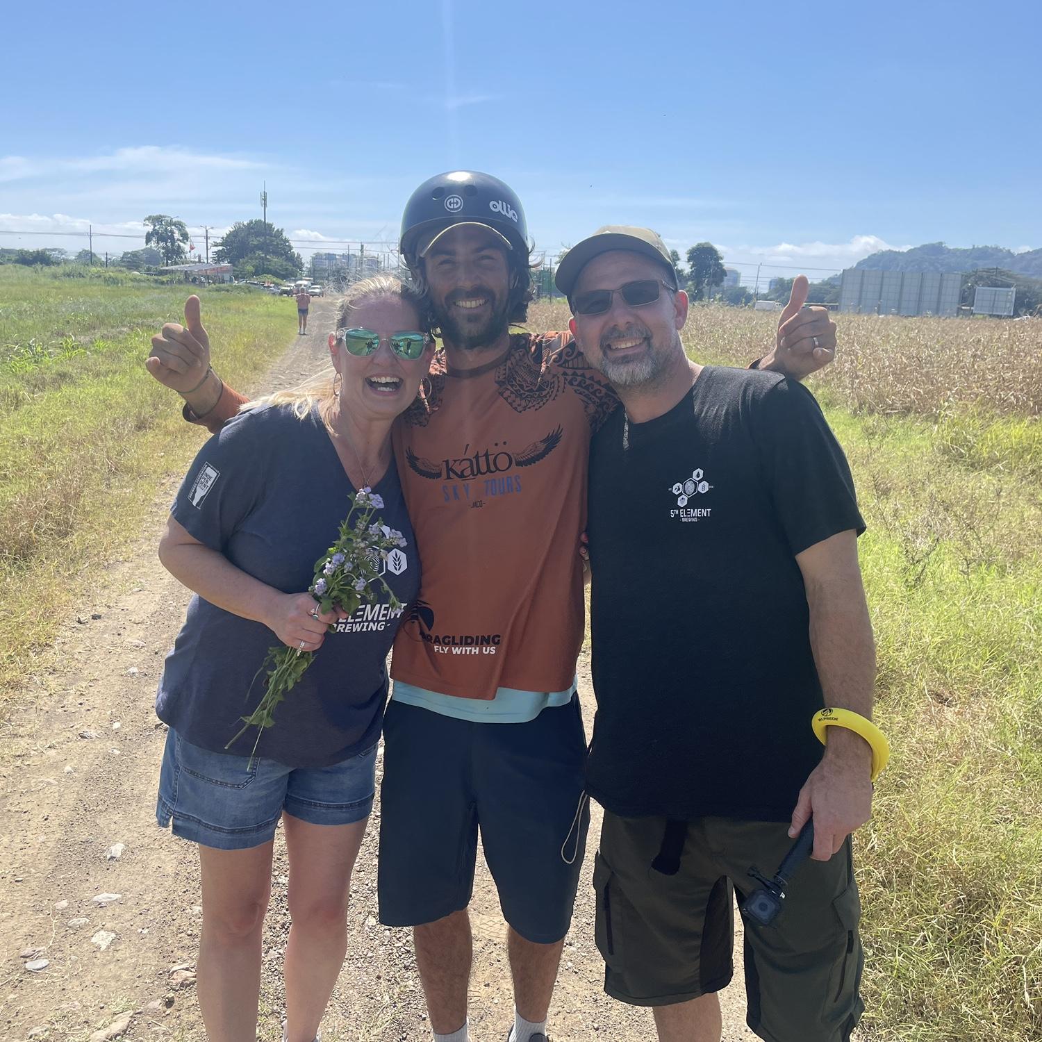And here is our first photo being engaged. Proposal was in the air, paragliding in Costa Rica. This was a first proposal the instructors ever had witnessed at 1000 ft in the air! Ours too, ha.