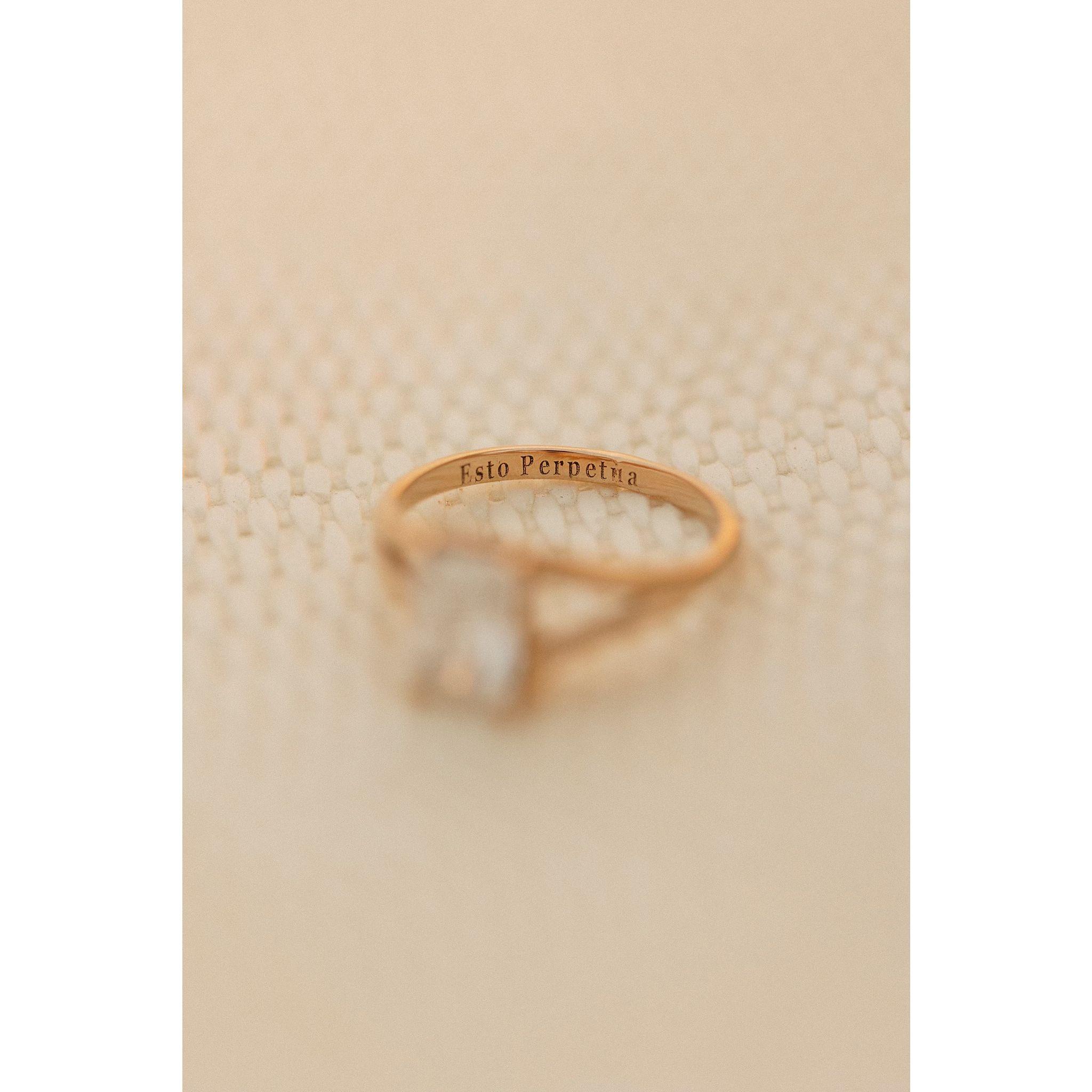 We got engaged in Idaho, so gave engraved the state motto which means, It Is Forever.