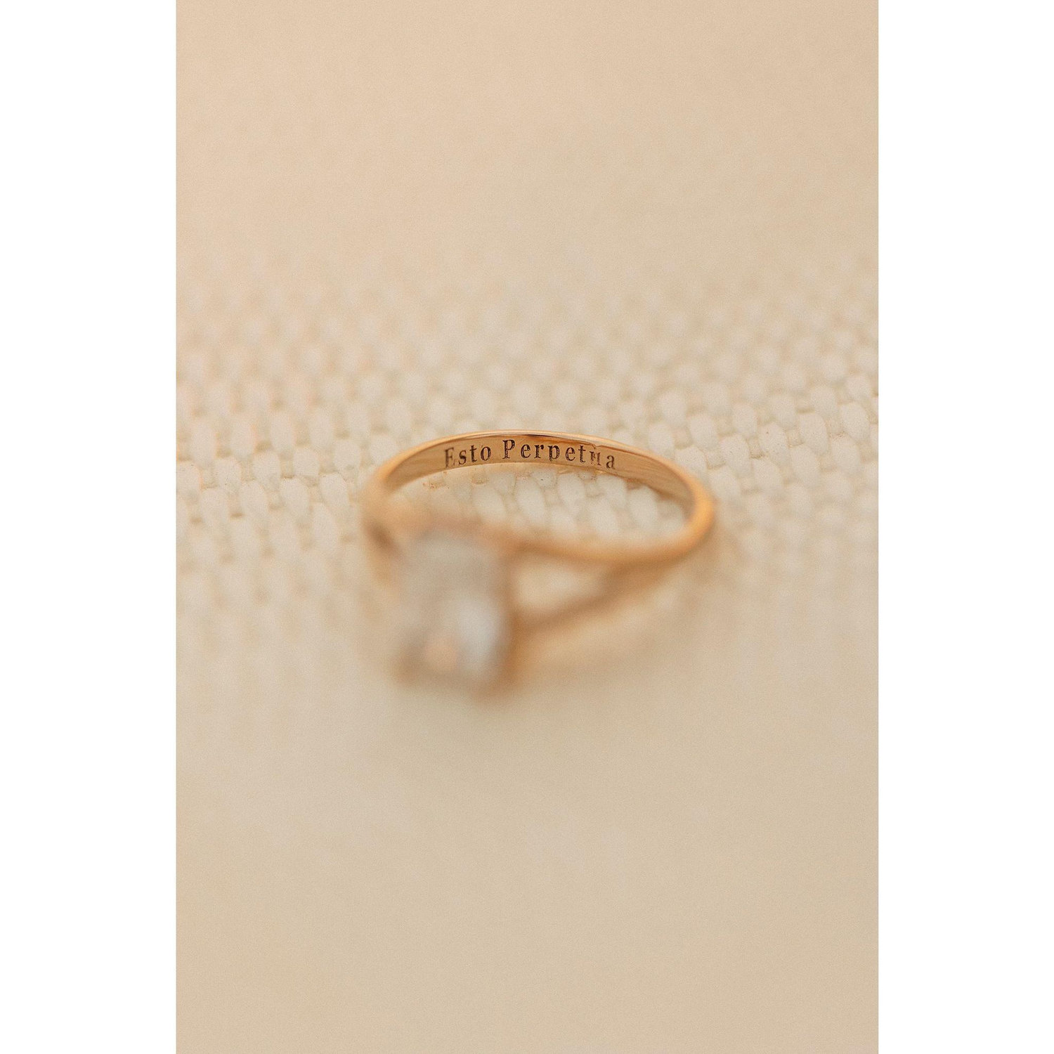 We got engaged in Idaho, so gave engraved the state motto which means, It Is Forever.