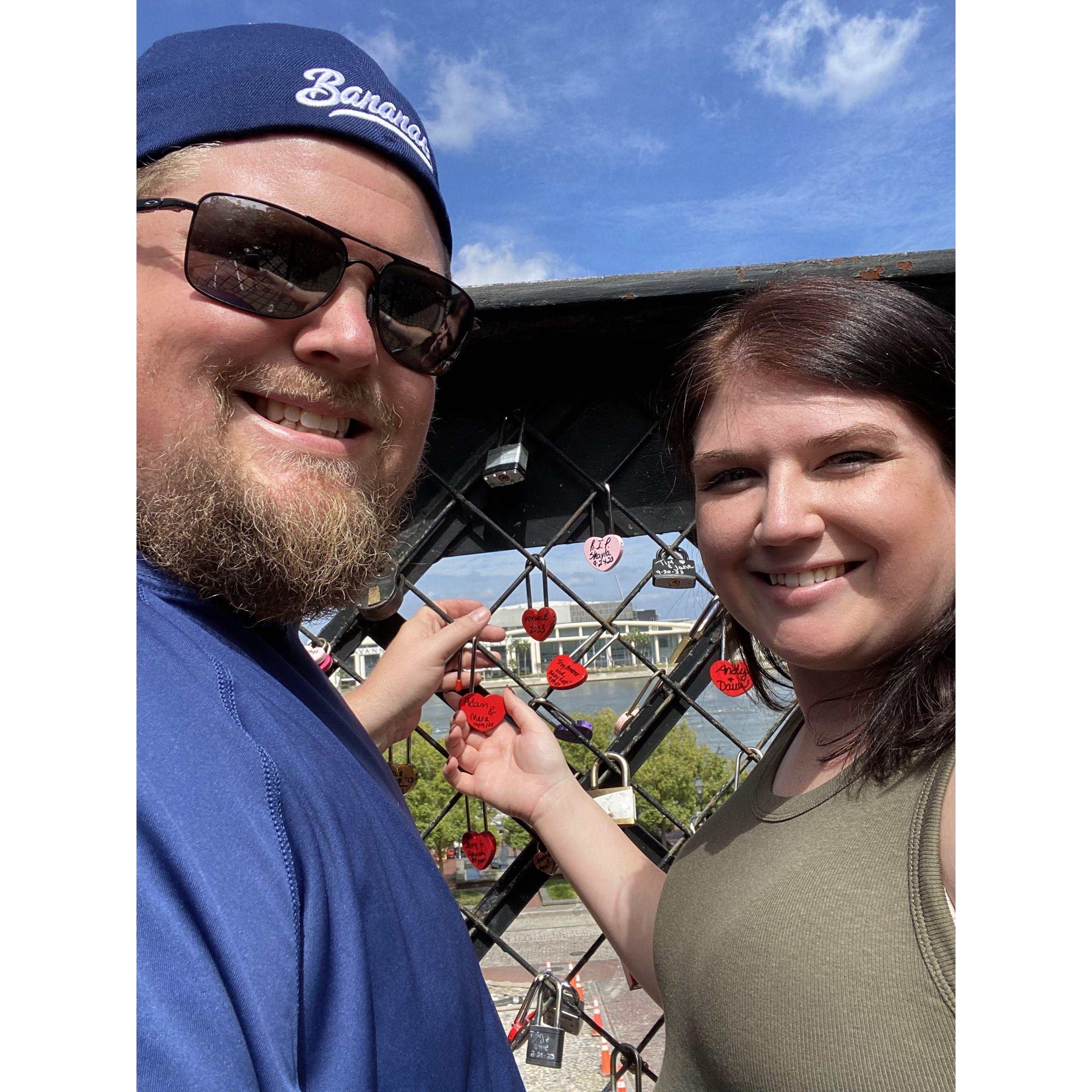 Adding a lock to Love Lock Bridge in Savannah, GA
