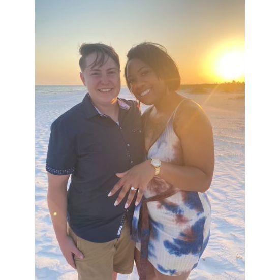 Allyson said yes...KC planned a beautiful dinner and sunset walk on the beach, where she had a band playing.  That same band is playing for the wedding!