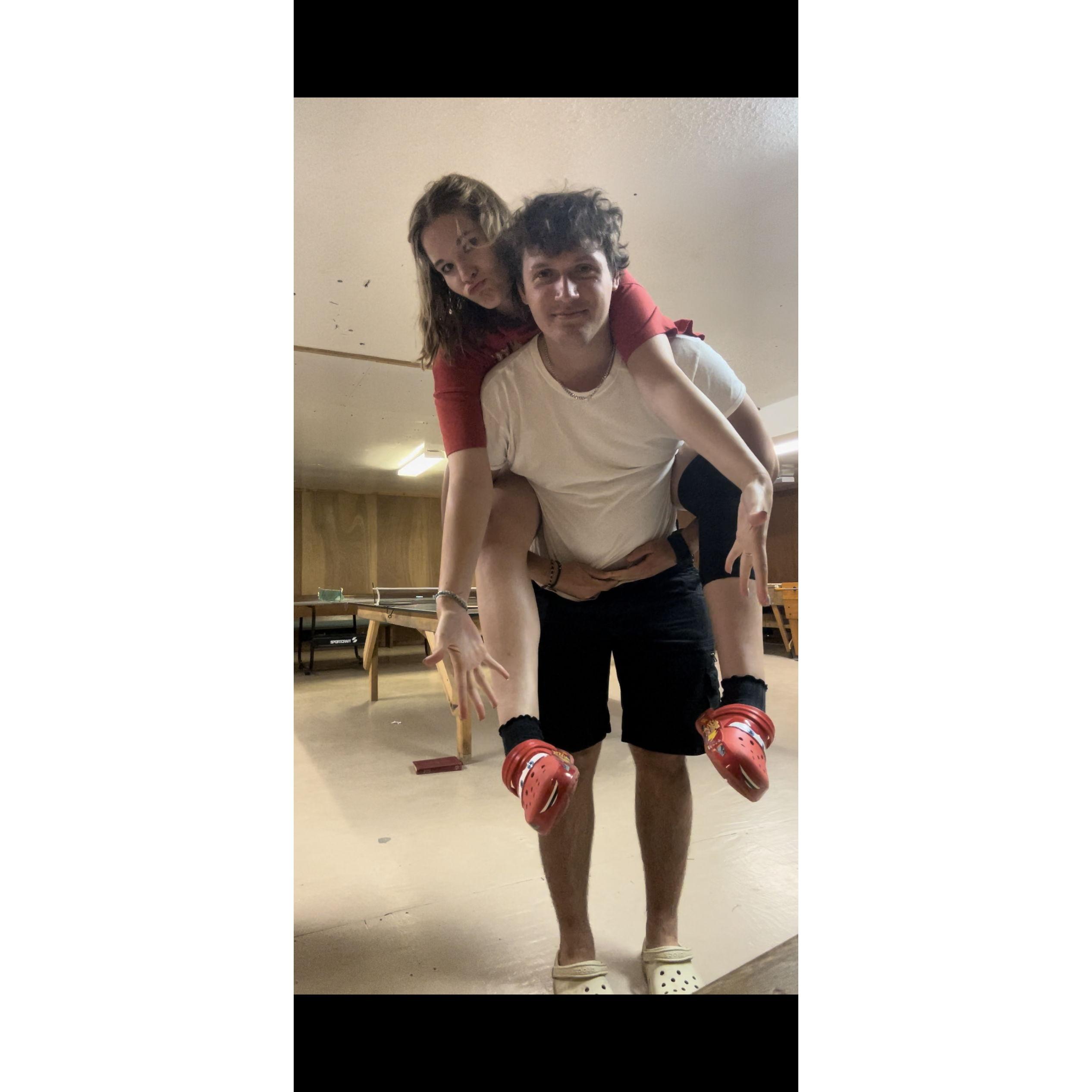 Showing off my birthday present of Lightning McQueen crocs at Storybook Lodge