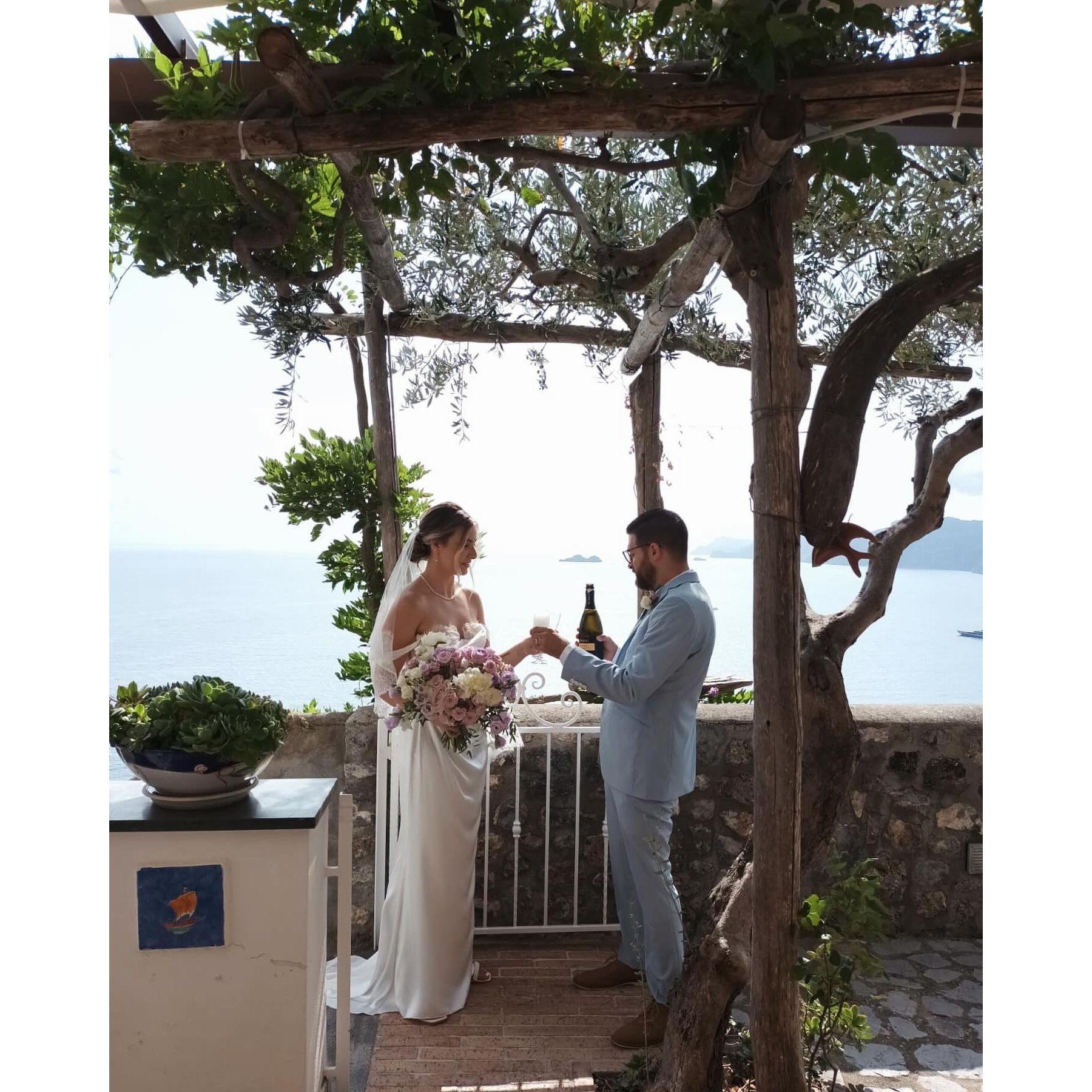 Popping champagne after the ceremony