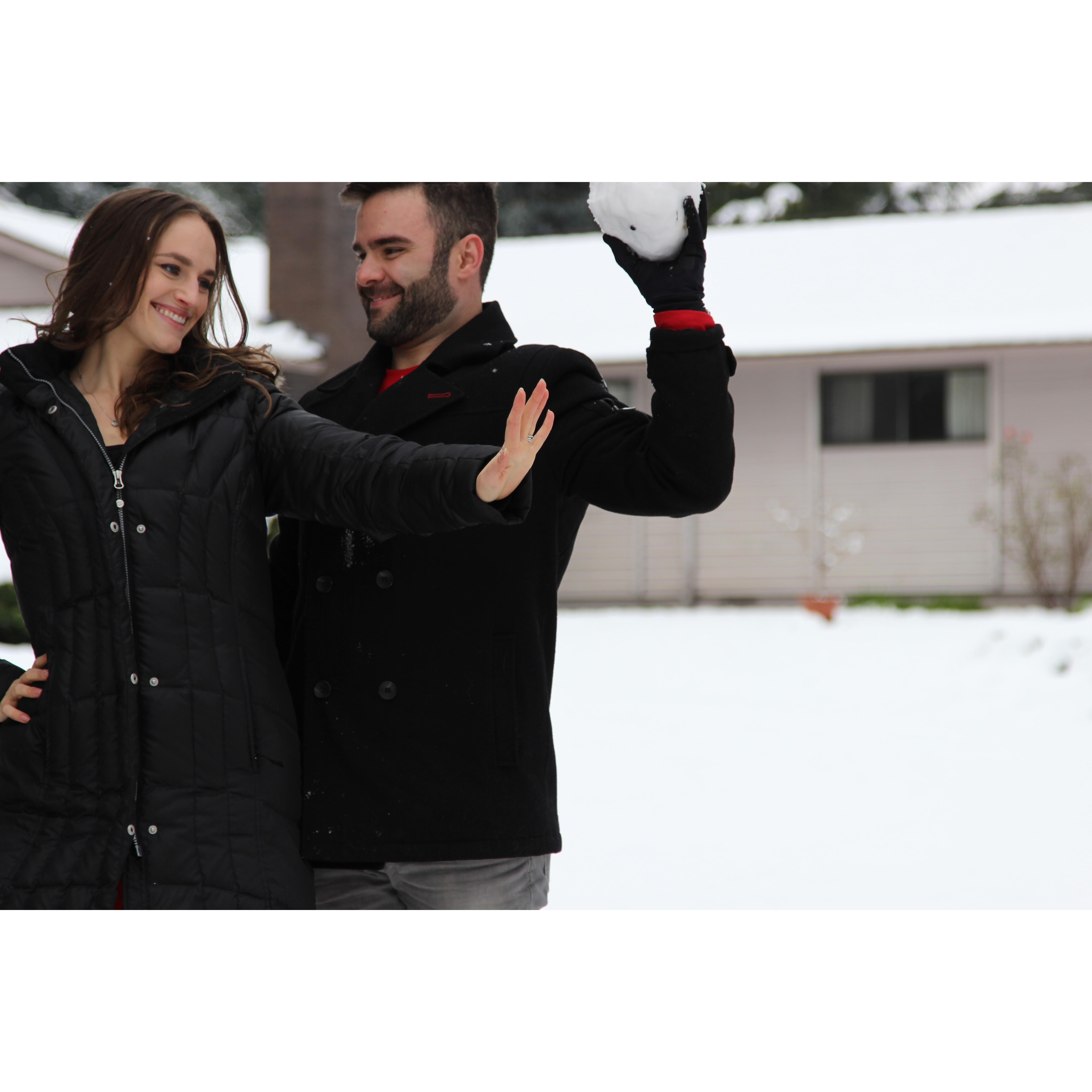 It was beautiful and snowing this past winter and we took pictures in our back yard. Both showing our loves - my ring, and goofing off.