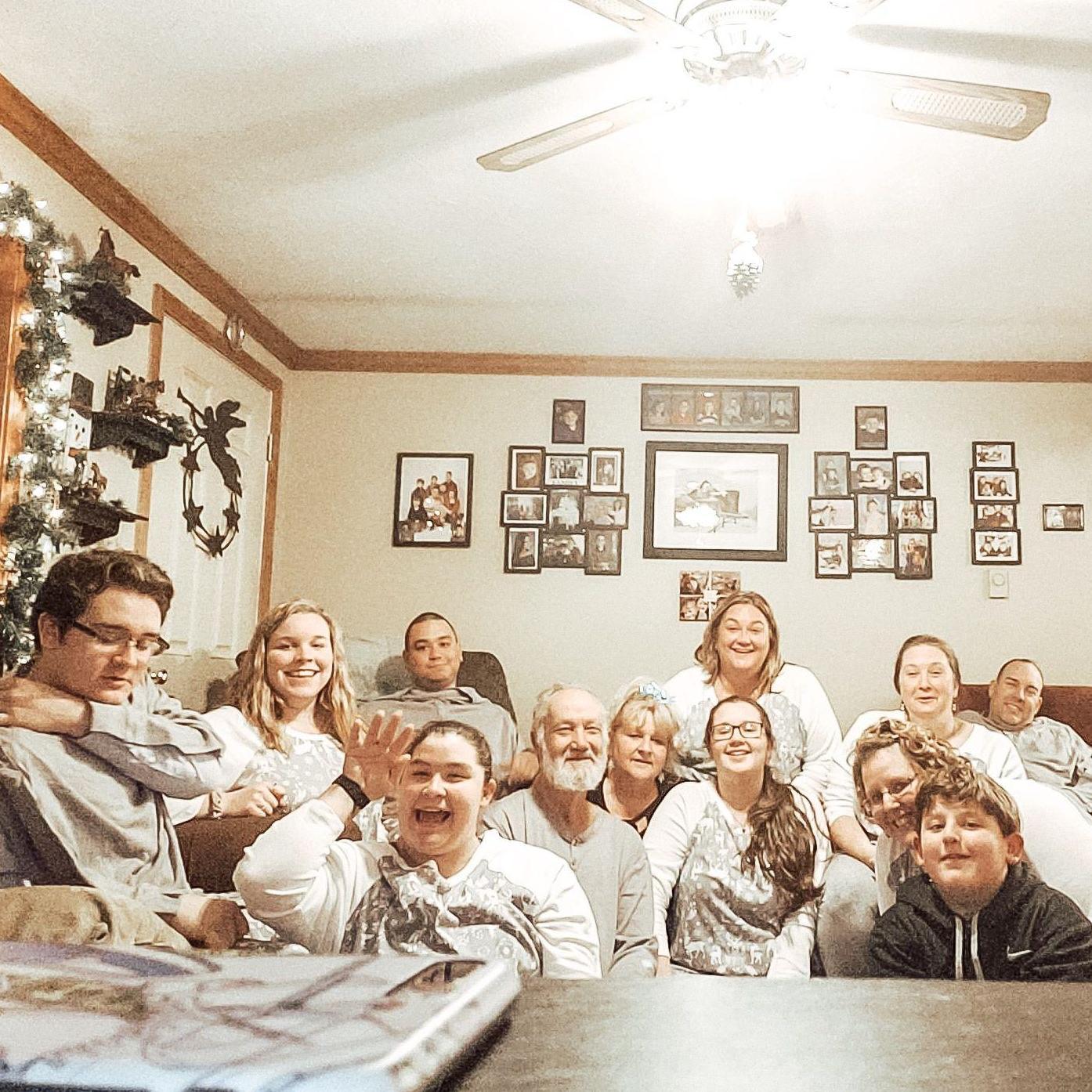 Kayla's family celebrating Christmas together at Grandpa & Grandma D's house