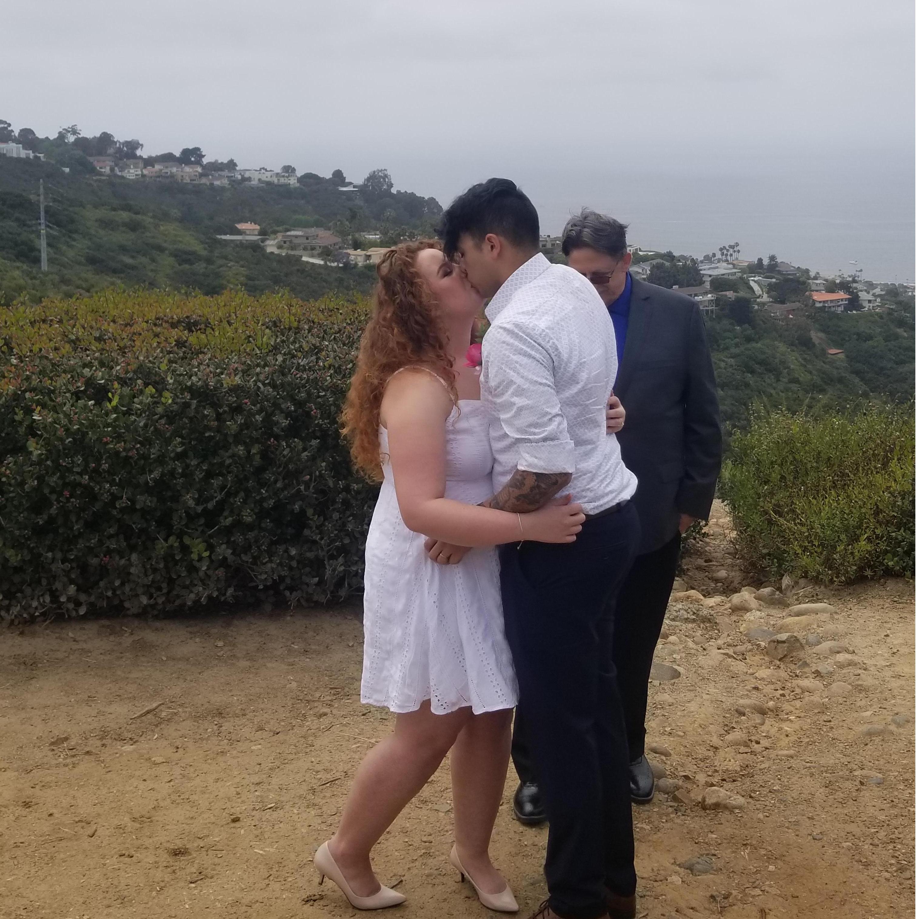 Our first official wedding kiss at our intimate elopement ceremony on May 24, 2020