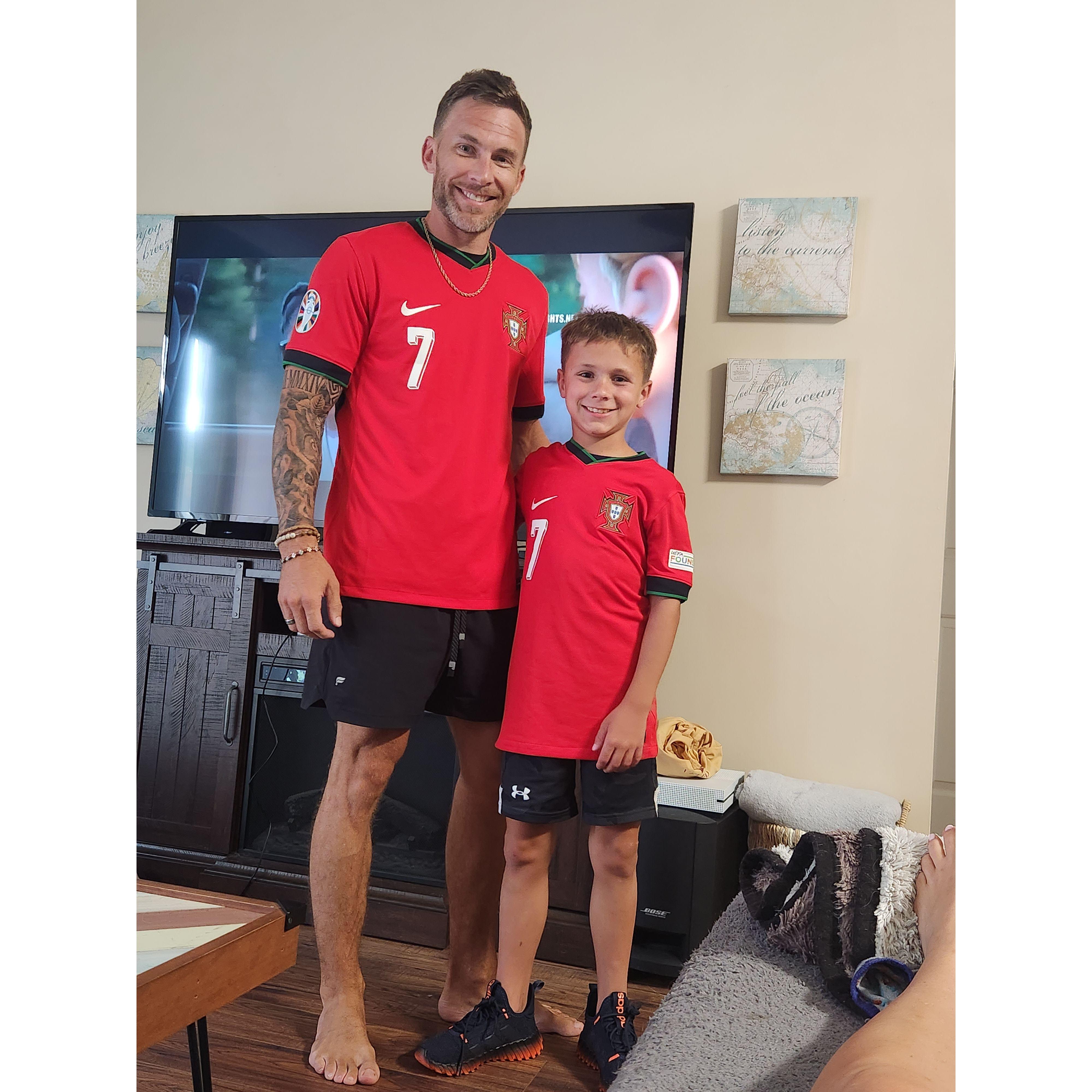 The boys watching Portugal in their matching soccer Jerseys!