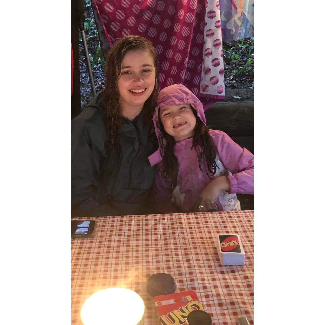 Our girls camping in the rain.