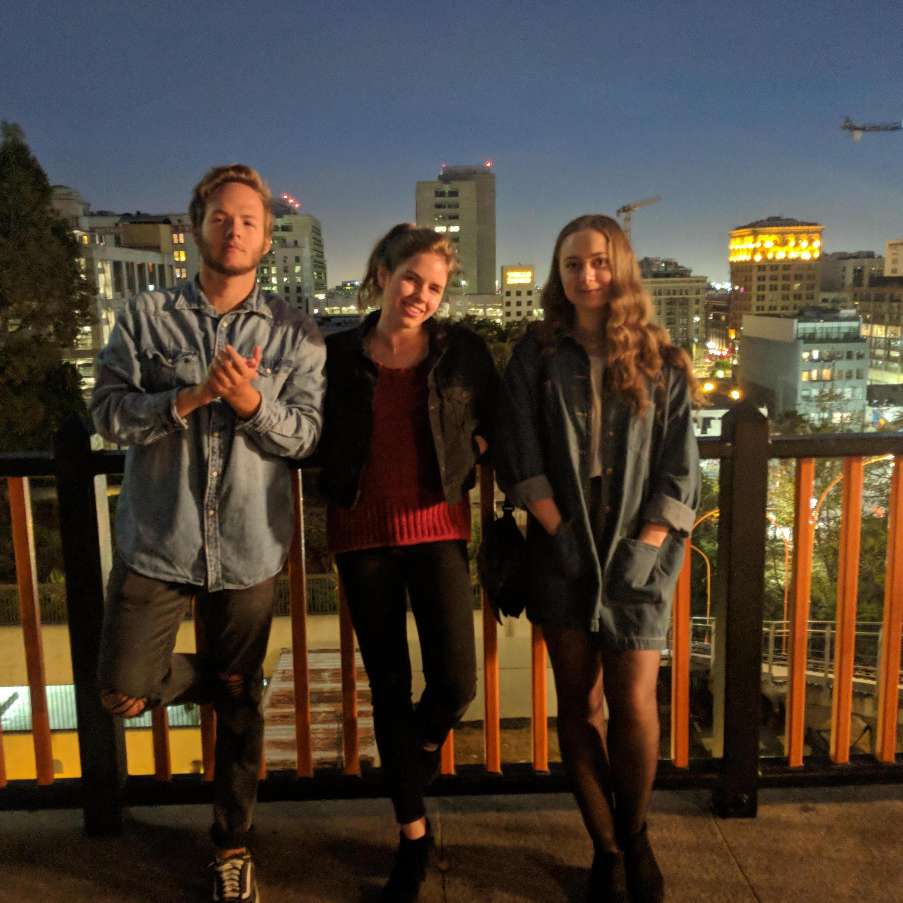 Kota, Annie, and Maid of Honor Bethany taking Angels Flight in DTLA