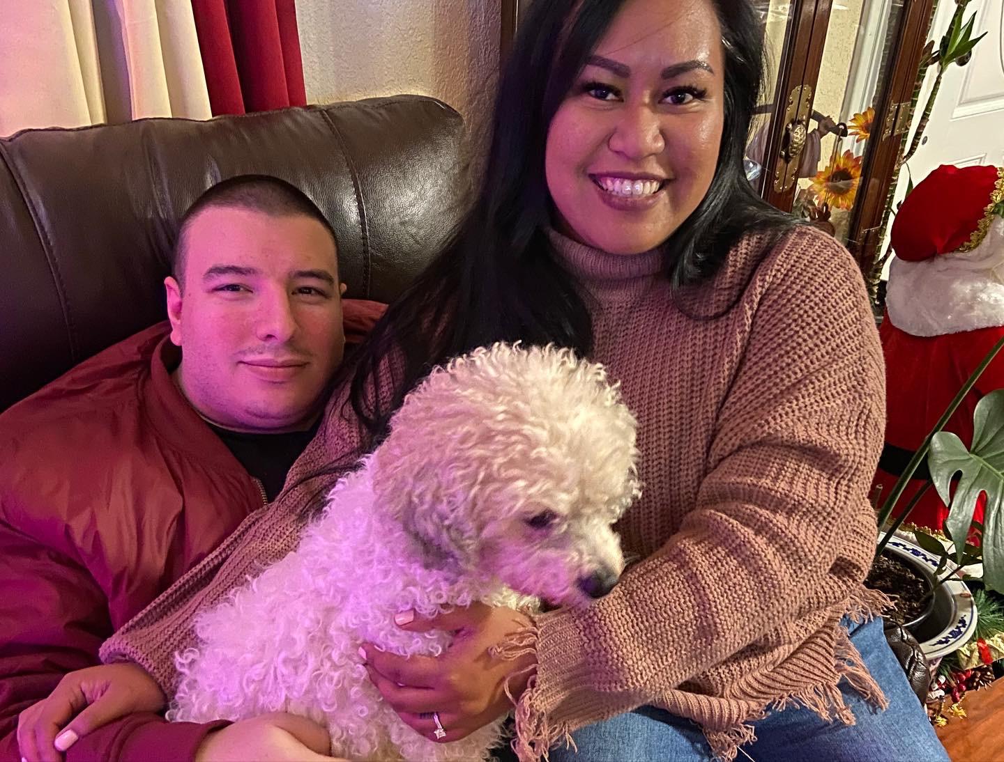 A little family photo during Thanksgiving 2021 with our late fur baby, Boogie