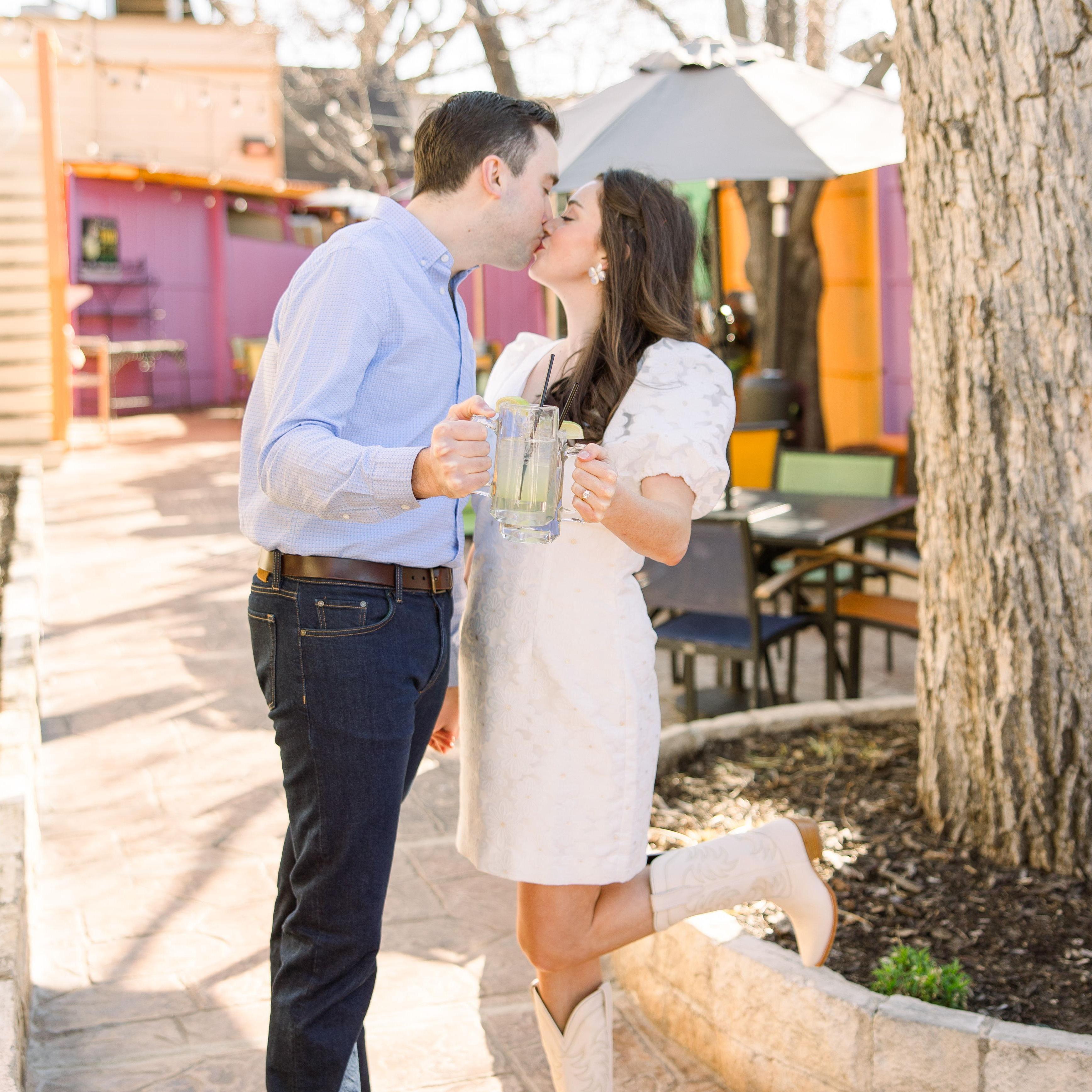 Cheers-ing on the patio where they first met 3 years earlier
