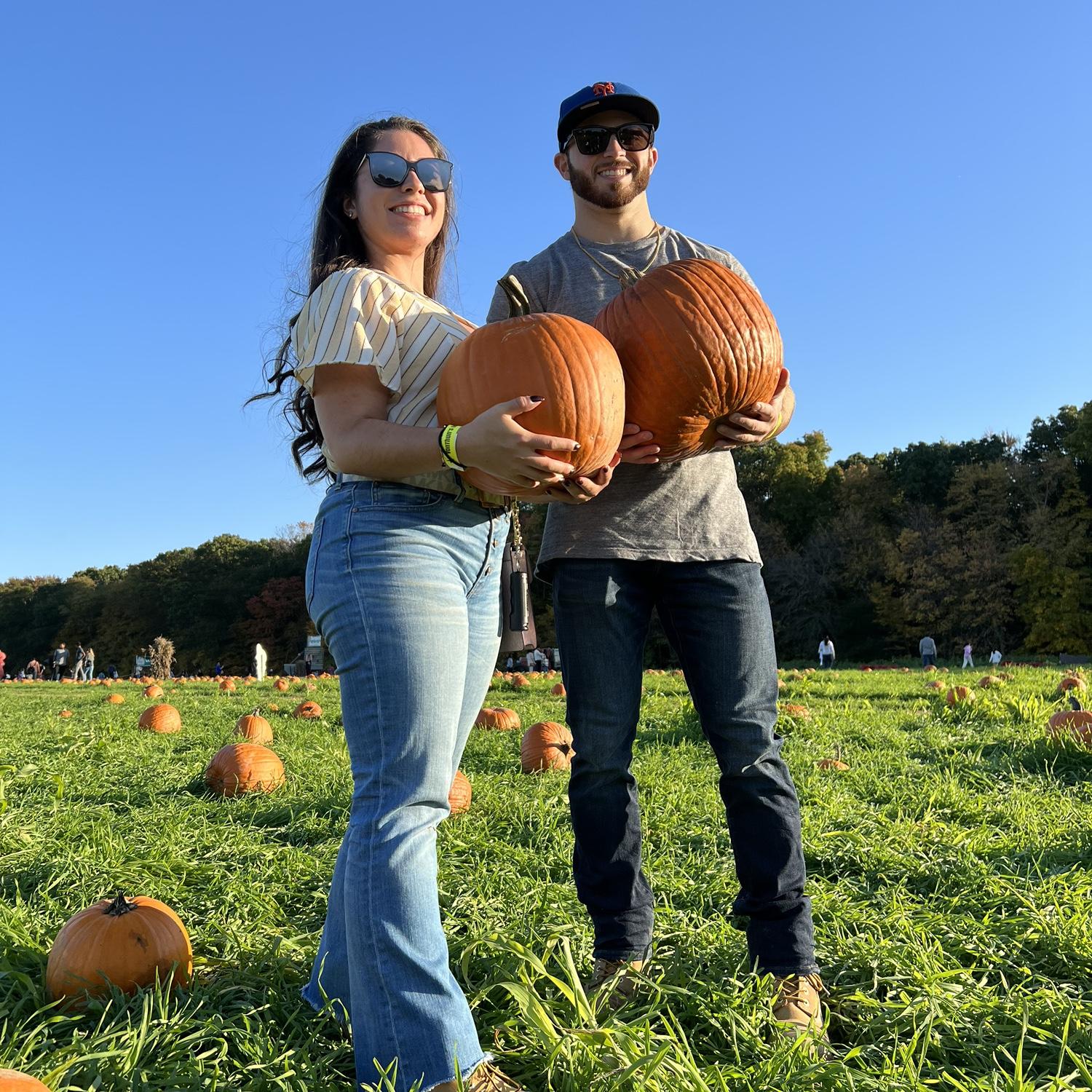 Todd and Vanessa picking pumpkins out to carve later that night together. This would become their yearly tradition together.